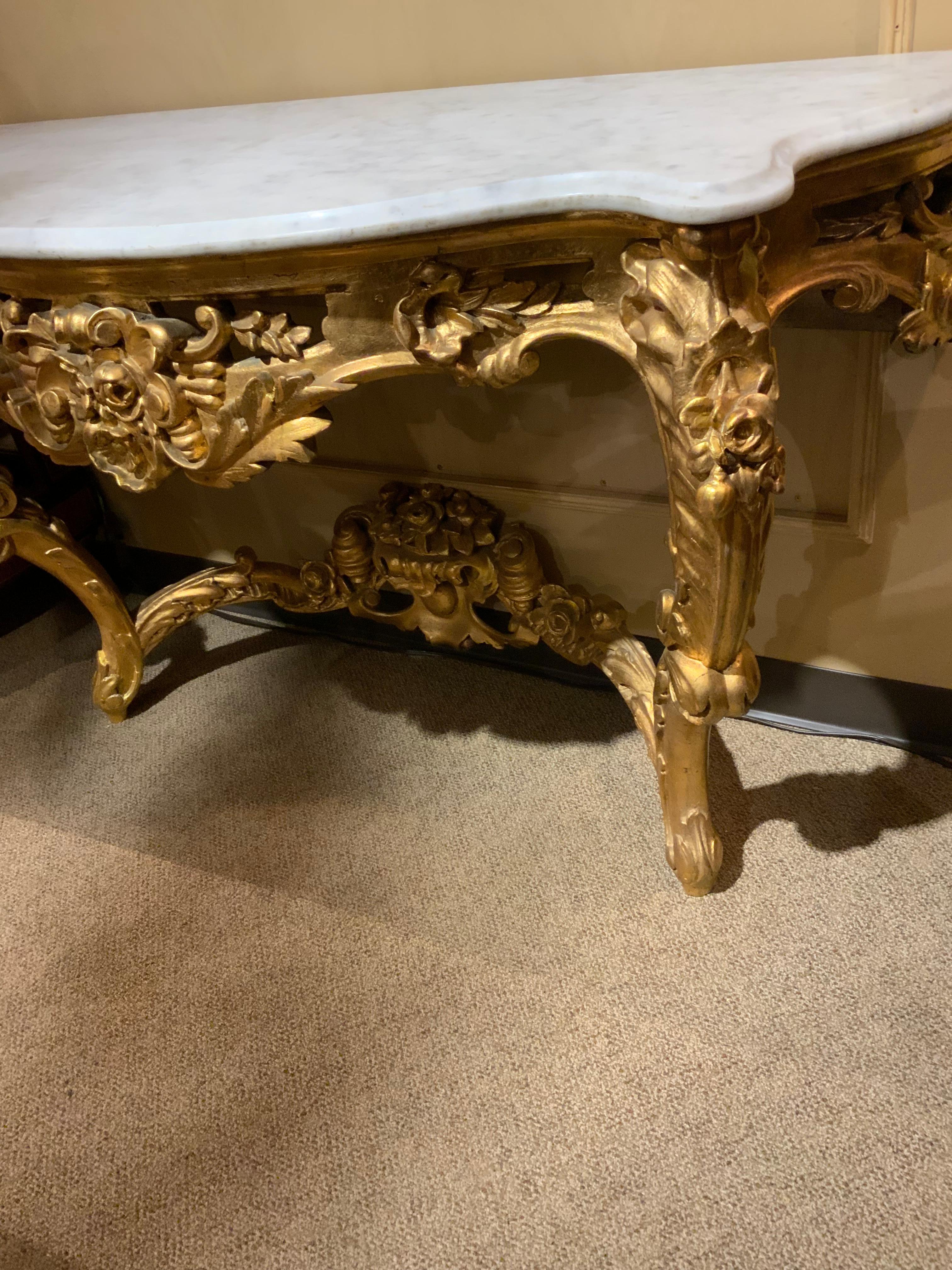 Louis XV Pair of French Giltwood consoles with white marble tops For Sale
