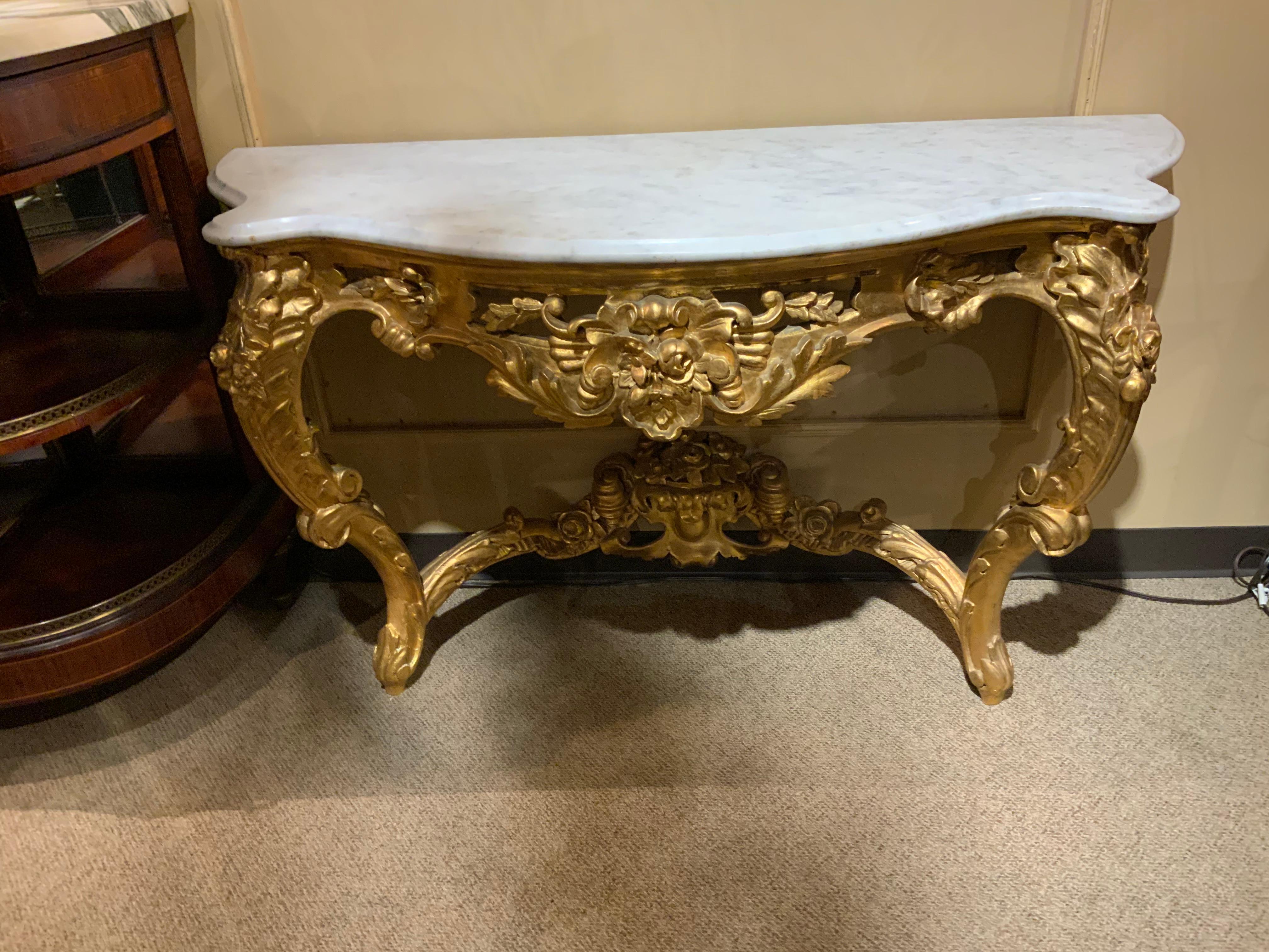 Hand-Crafted Pair of French Giltwood consoles with white marble tops For Sale