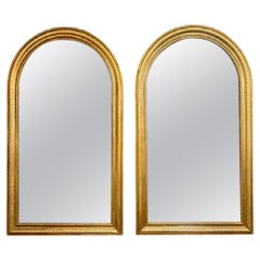Pareja de espejos franceses dorados con tapa de arco Louis Philippe