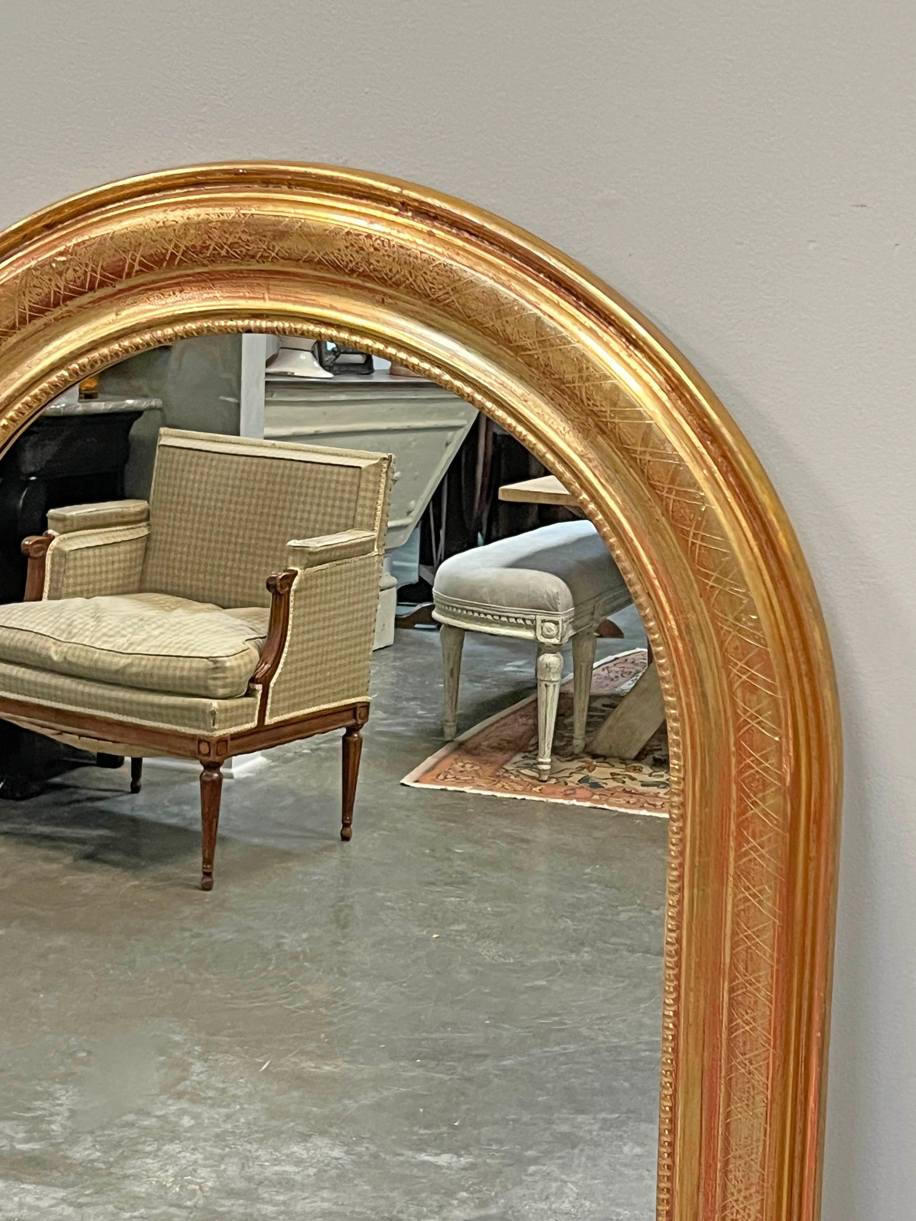 Carved Pair of French Gold Gilt Arched Mirrors