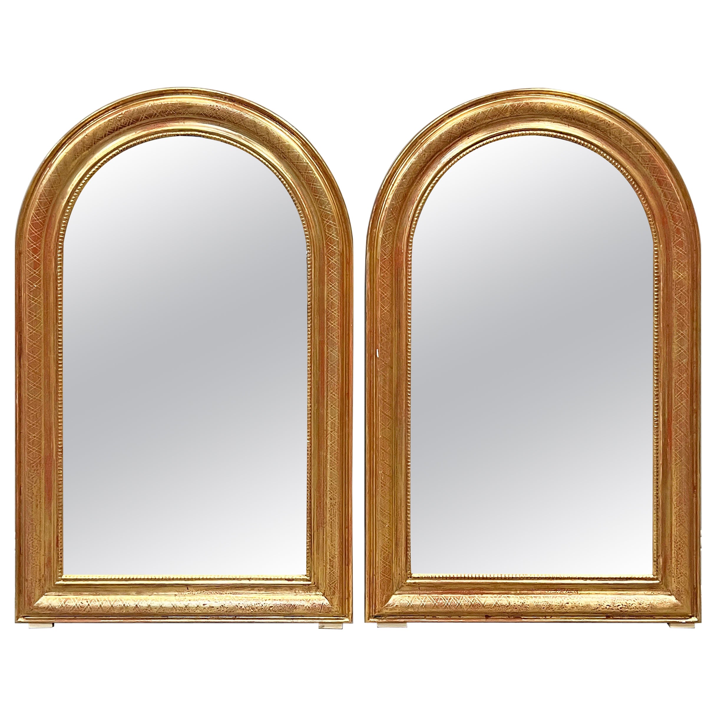 Pair of French Gold Gilt Arched Mirrors