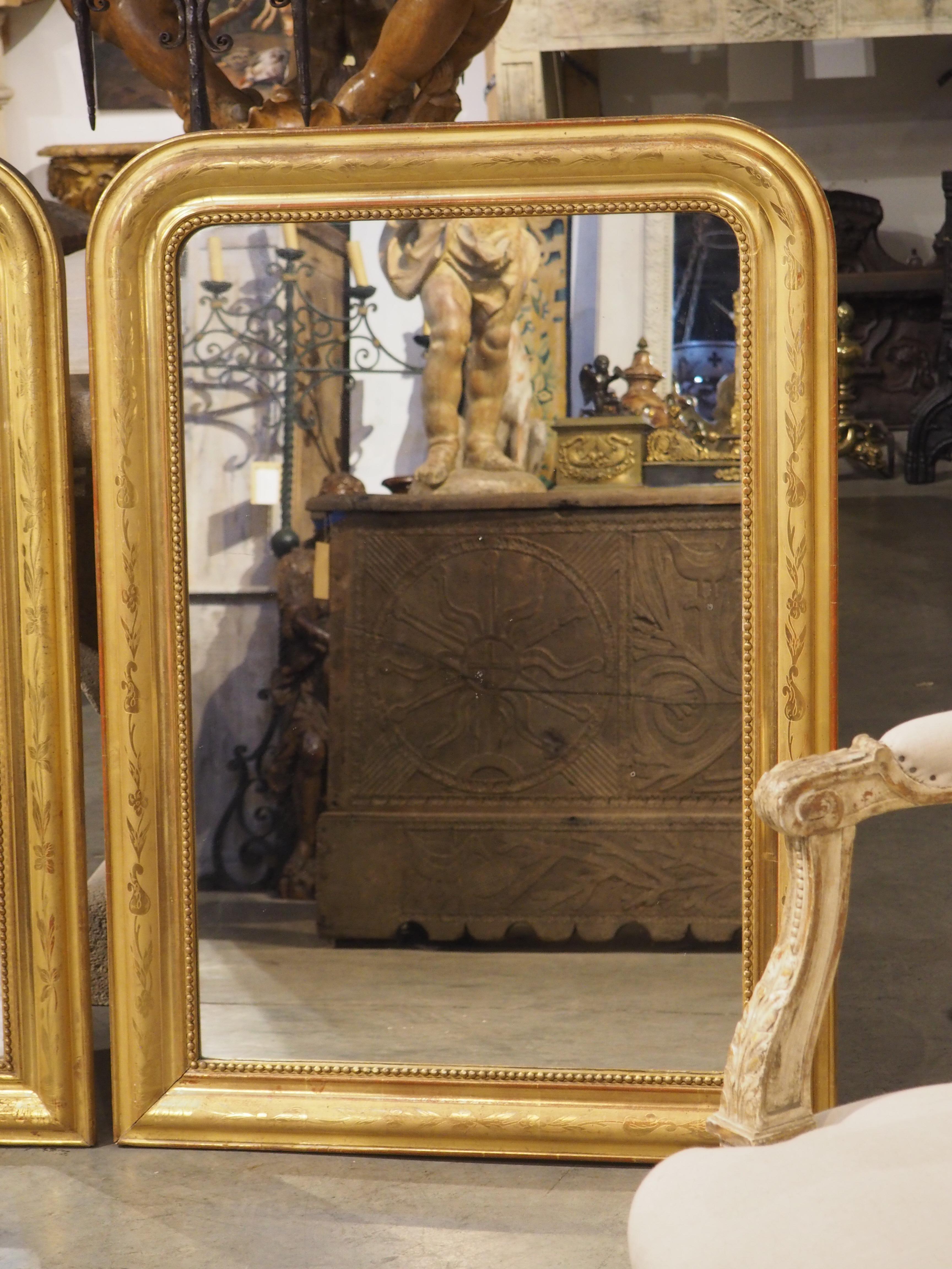 19th Century Pair of French Gold Leaf Louis Philippe Mirrors with Floral Motifs, C. 1890 For Sale