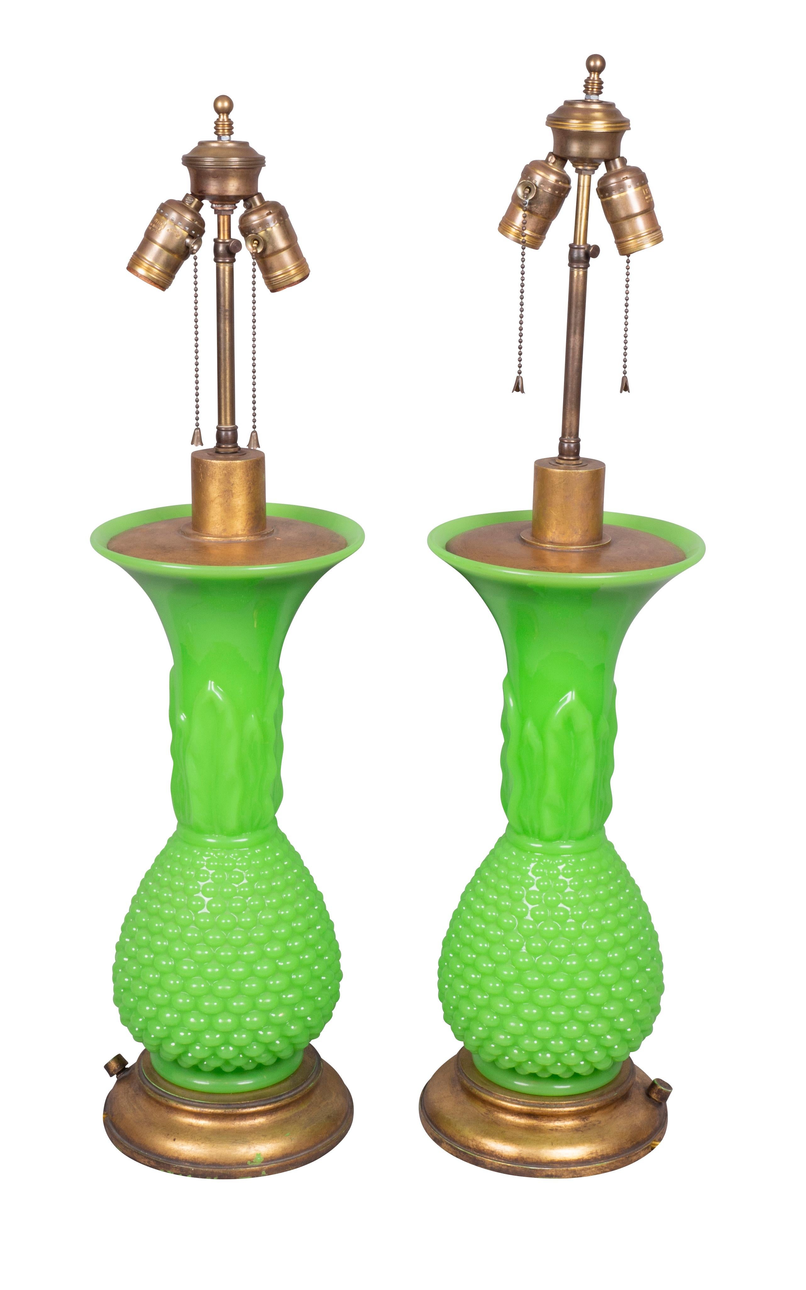 Great color with hobnail decoration with molded leaf decoration on the neck. Gilt metal bases.