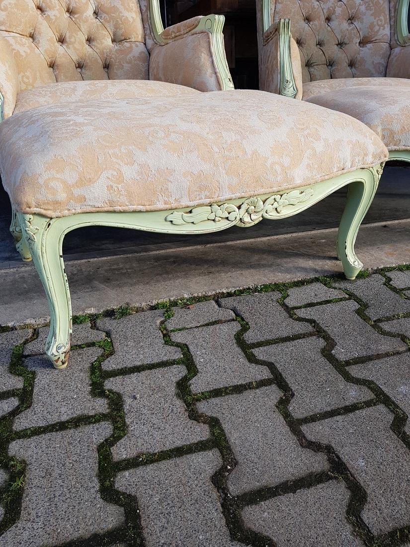 Fabric Pair of French Green Painted Wingback Chairs with Footstools, Late 20th Century For Sale