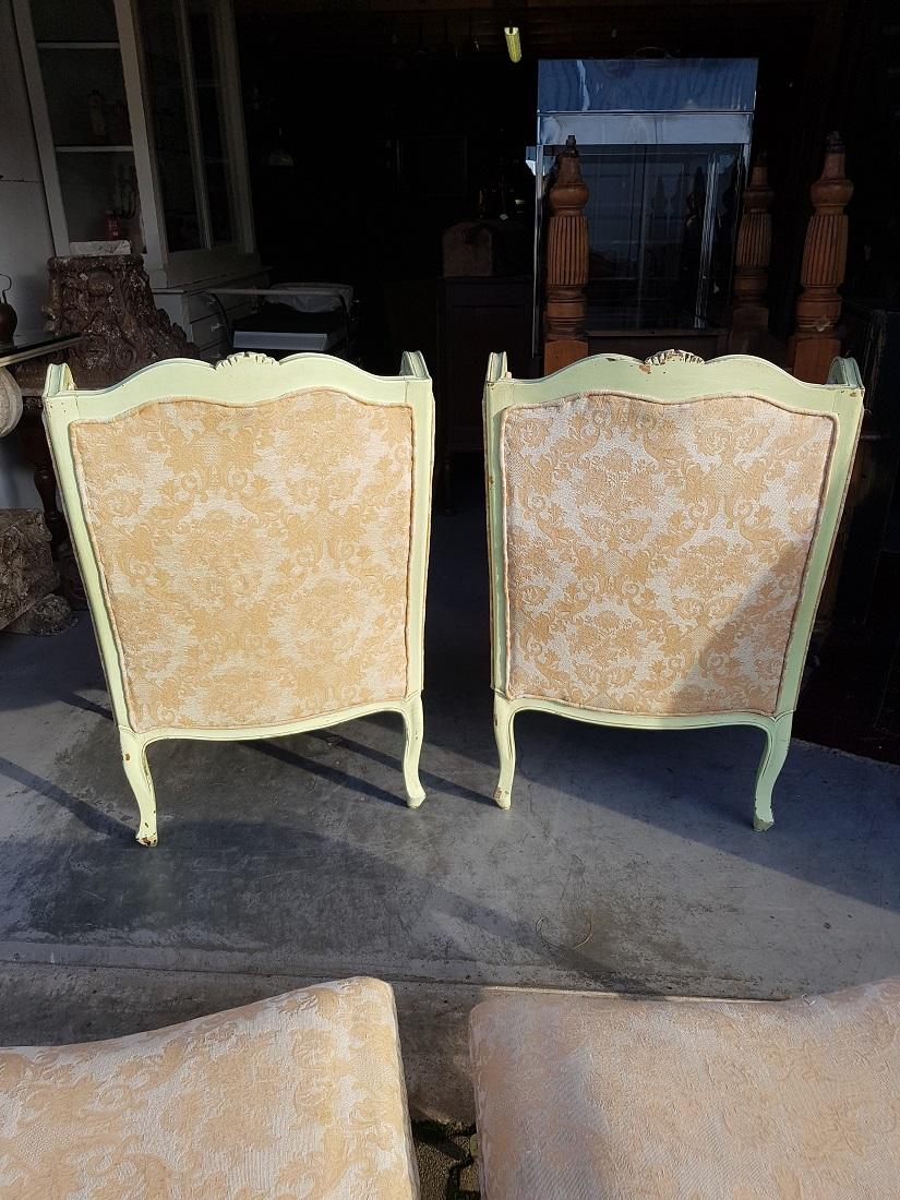 Pair of French Green Painted Wingback Chairs with Footstools, Late 20th Century For Sale 2