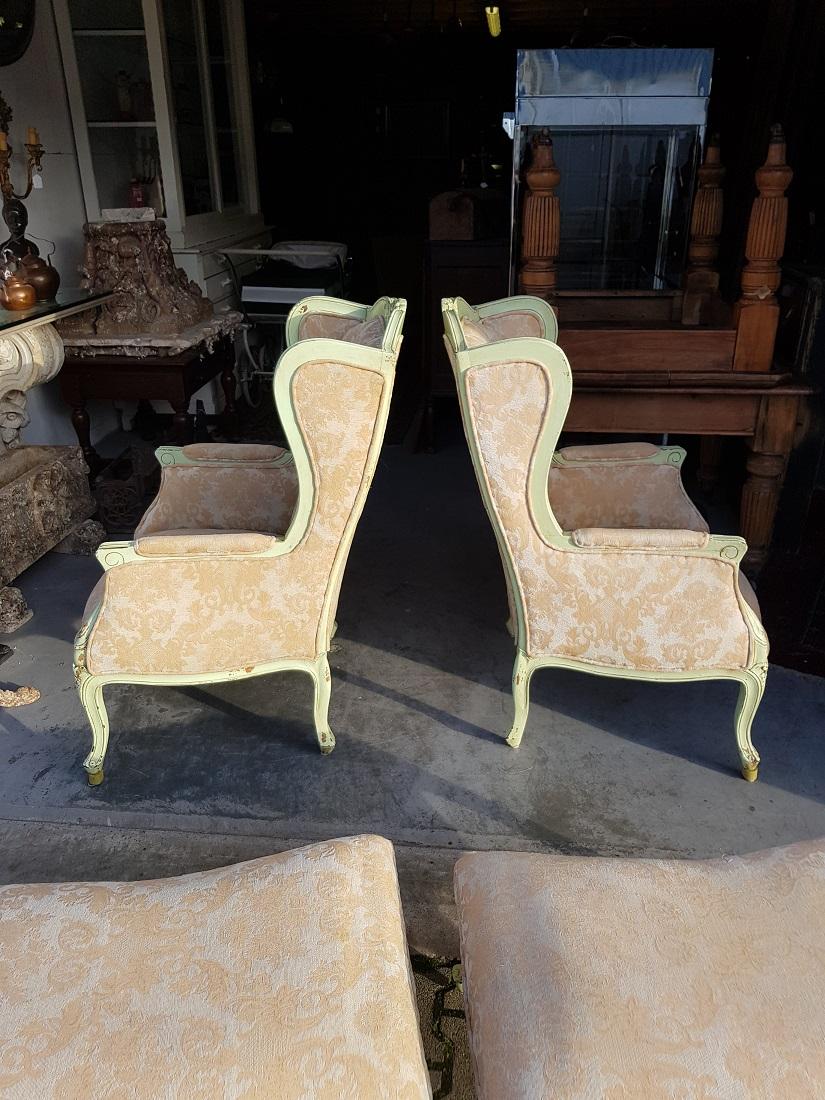 Pair of French Green Painted Wingback Chairs with Footstools, Late 20th Century For Sale 3