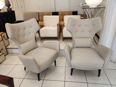 Pair of French greige Leather Armchairs