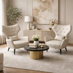 Pair of French greige Leather Armchairs