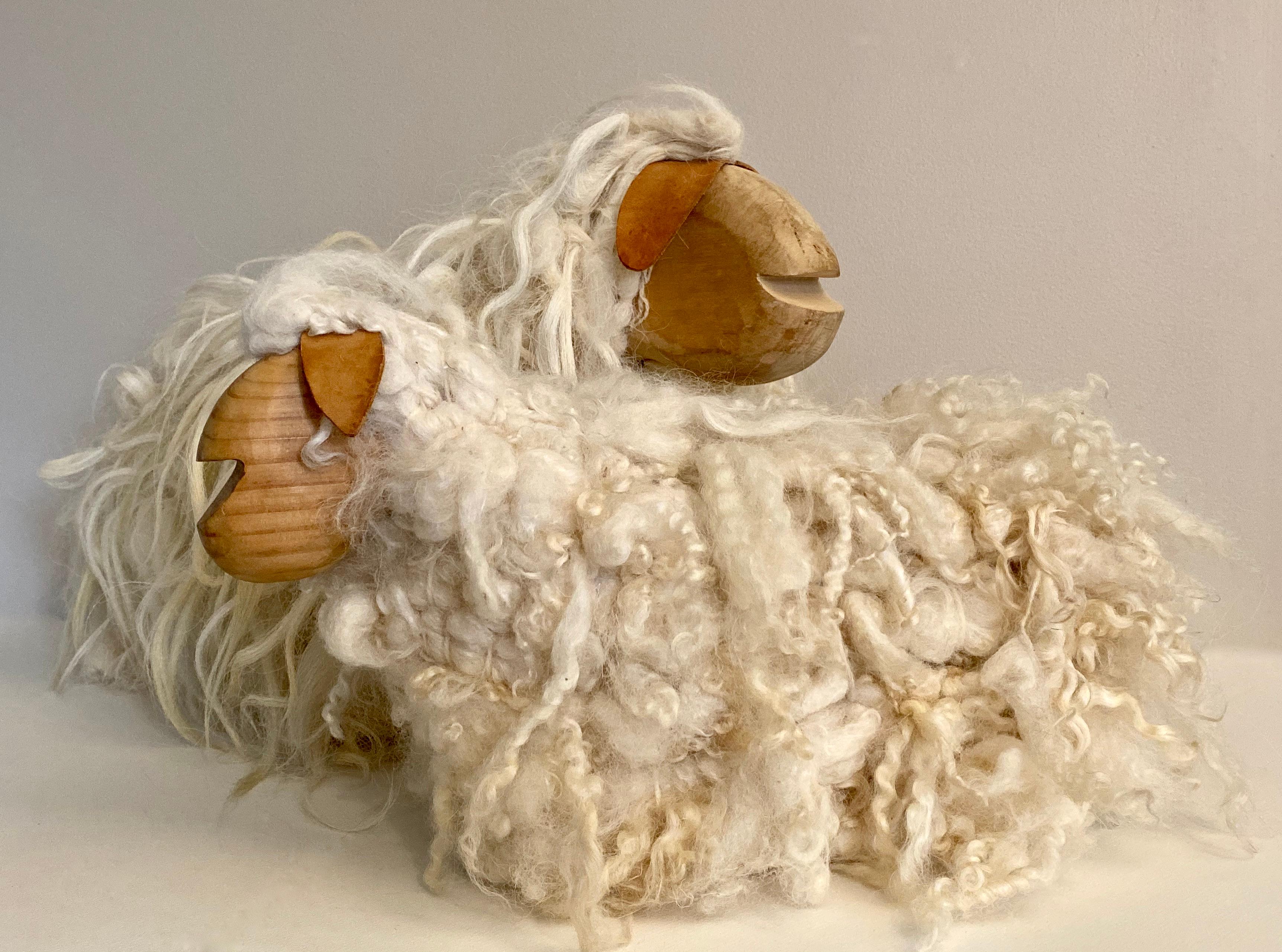 Pair of handcrafted wood and applied wool sheep in the manner of Lalanne. Larger sheep stamped on wood base 