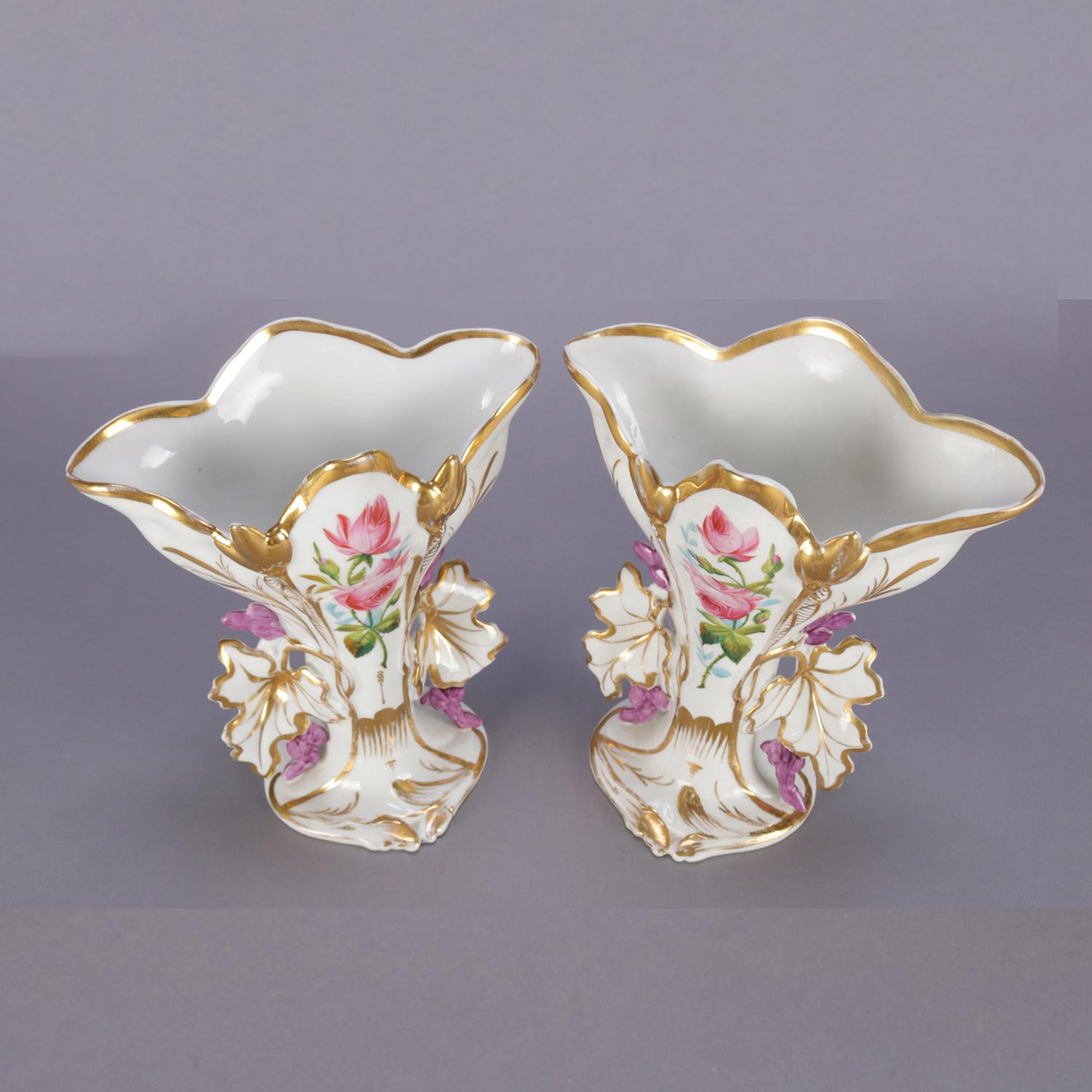 A pair of antique French porcelain Old Paris spill vases feature floral form with hand painted and gilt floral and foliate decoration, circa 1880.

Measure: 9