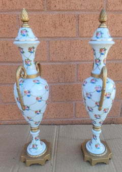 Pair of French Hand-Painted Porcelain and Gilt Metal Amphoras