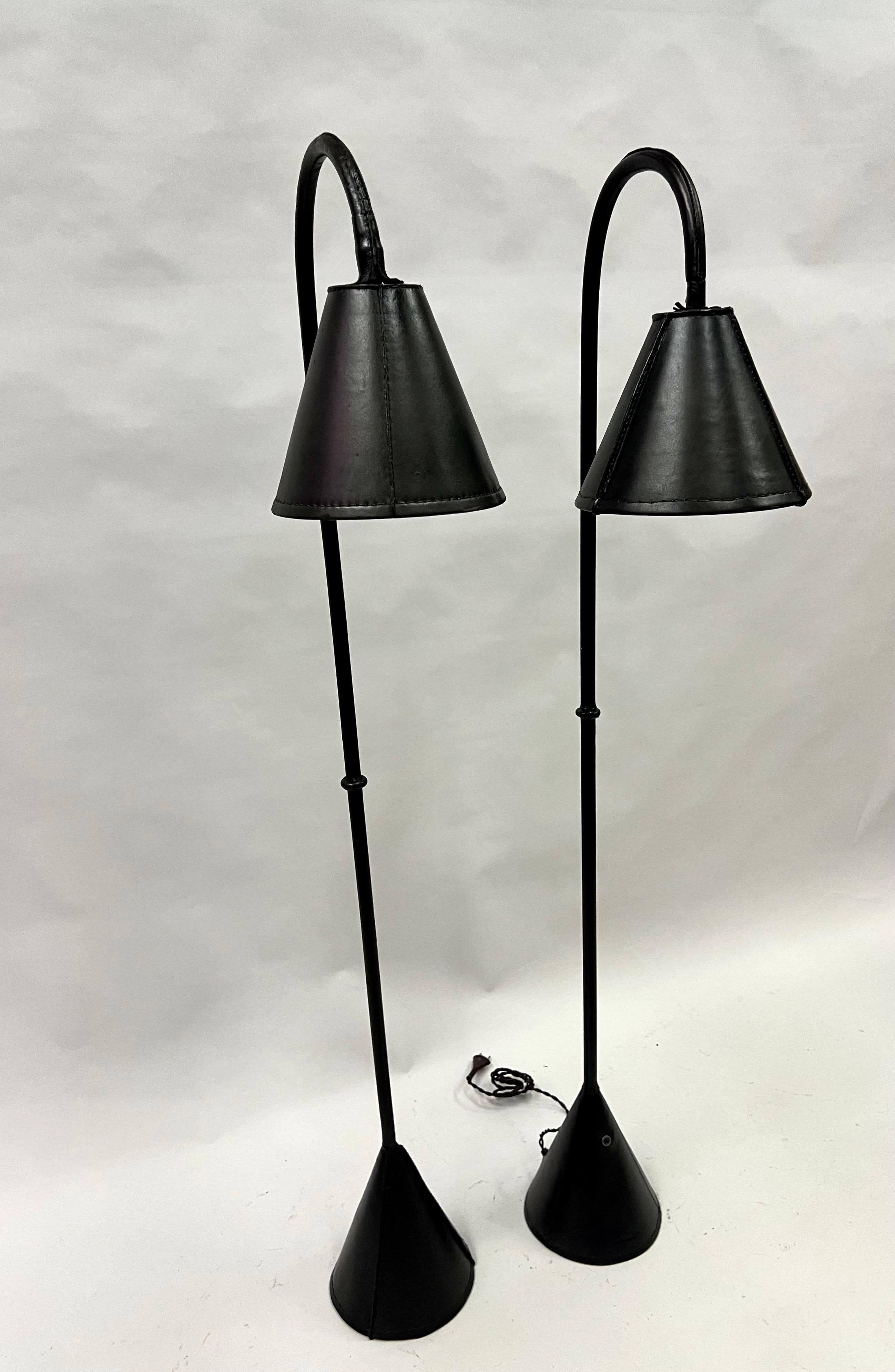 Hand-Crafted Pair of French Hand Stitched Black Leather Floor Lamps by Jacques Adnet For Sale