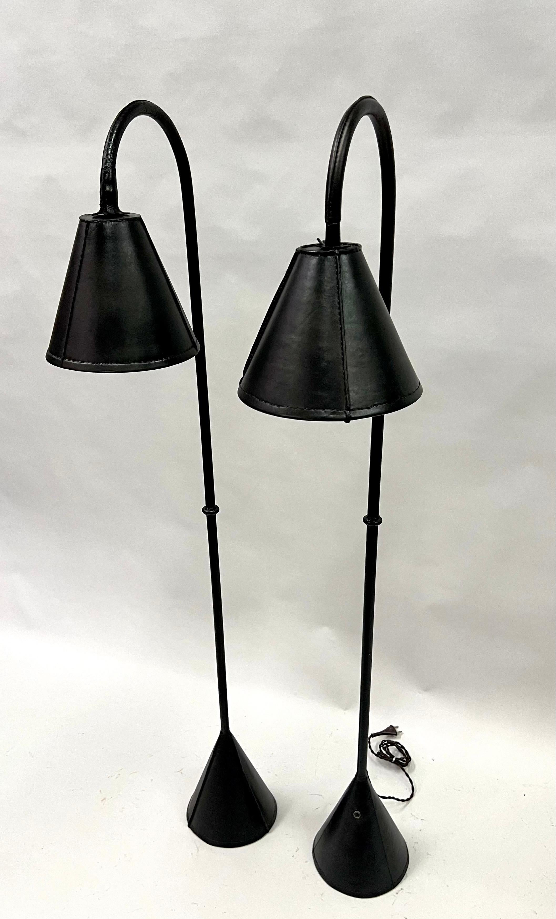 Pair of French Hand Stitched Black Leather Floor Lamps by Jacques Adnet In Good Condition For Sale In New York, NY