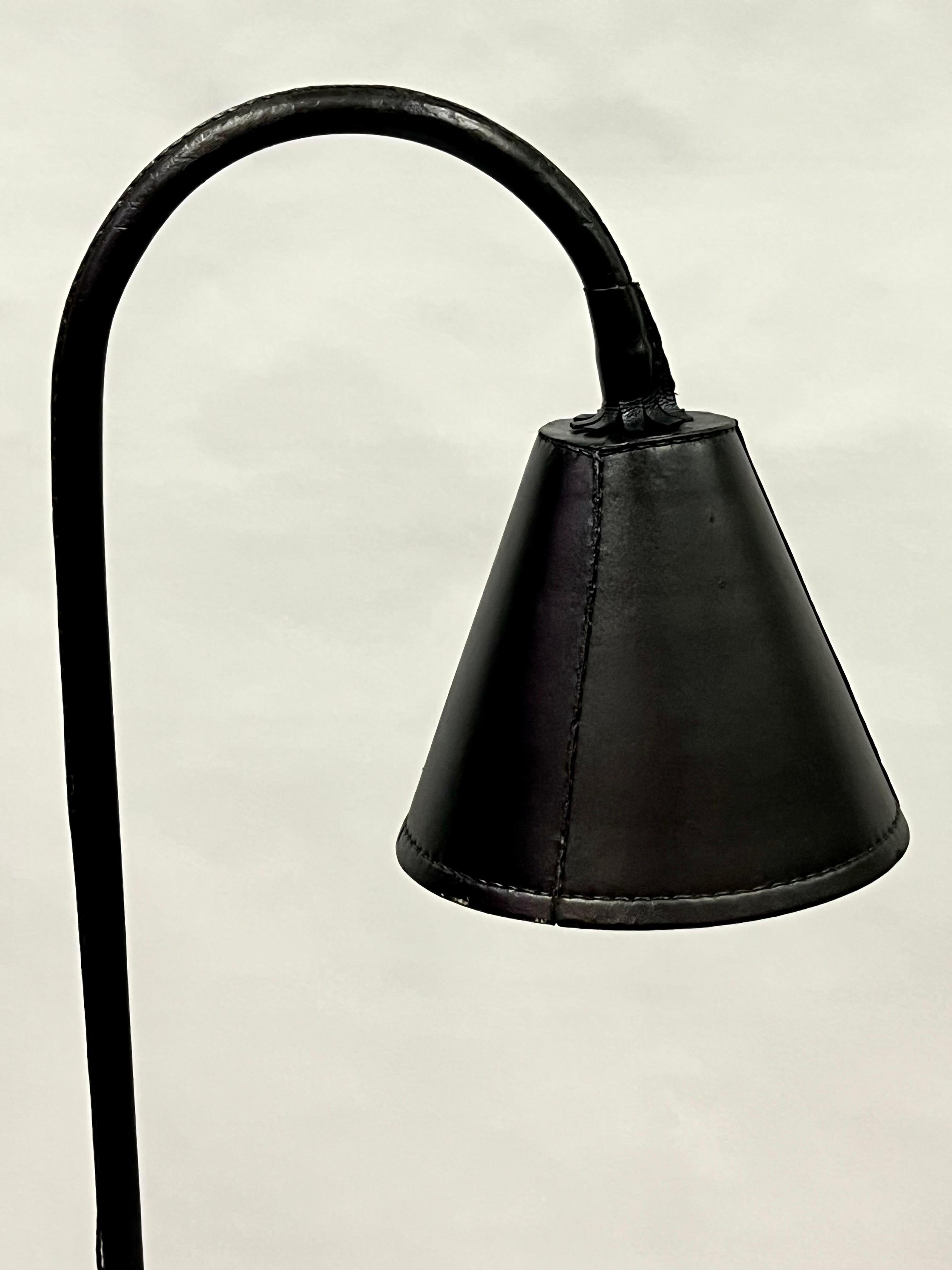 20th Century Pair of French Hand Stitched Black Leather Floor Lamps by Jacques Adnet For Sale