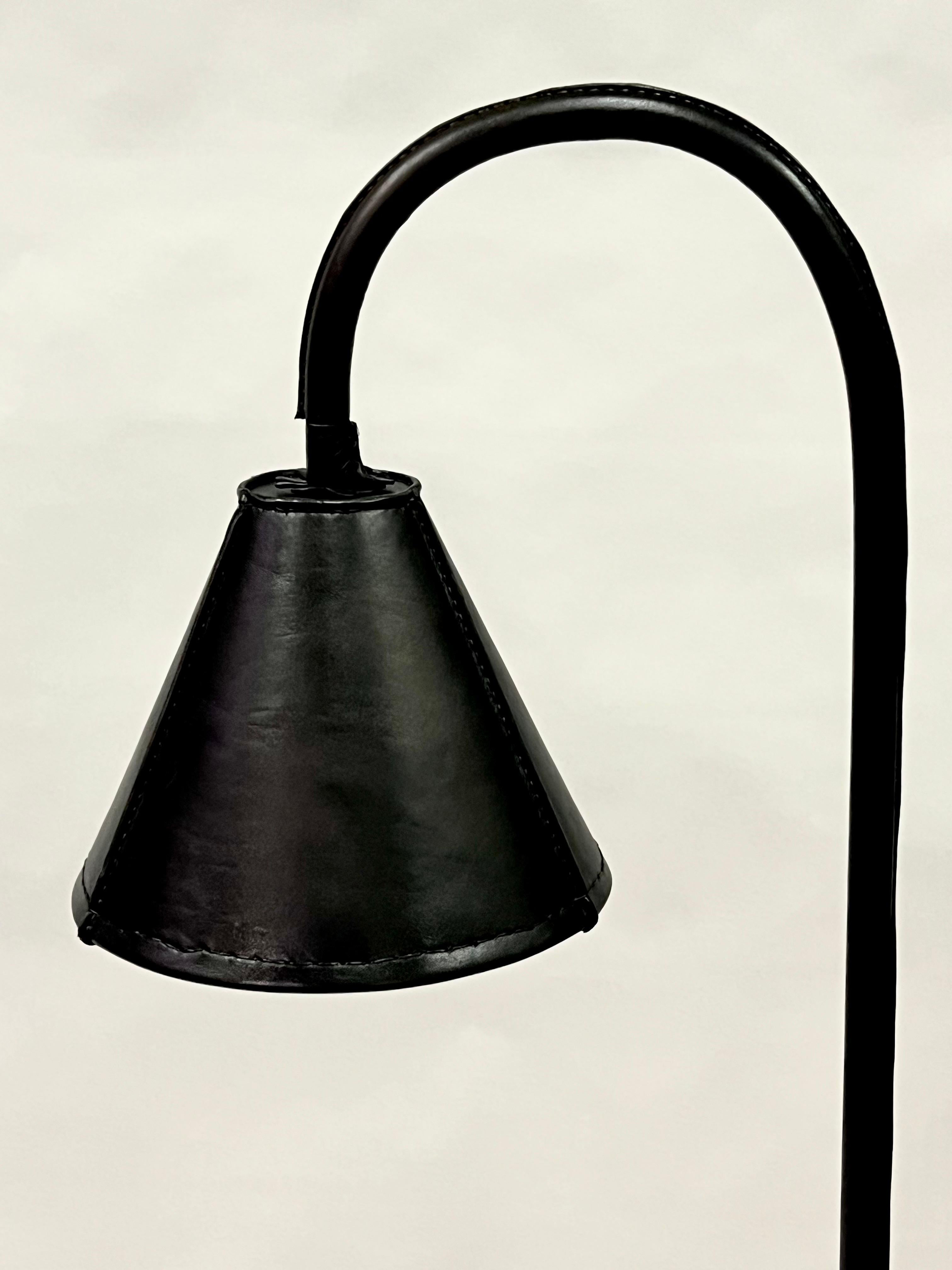 Steel Pair of French Hand Stitched Black Leather Floor Lamps by Jacques Adnet For Sale