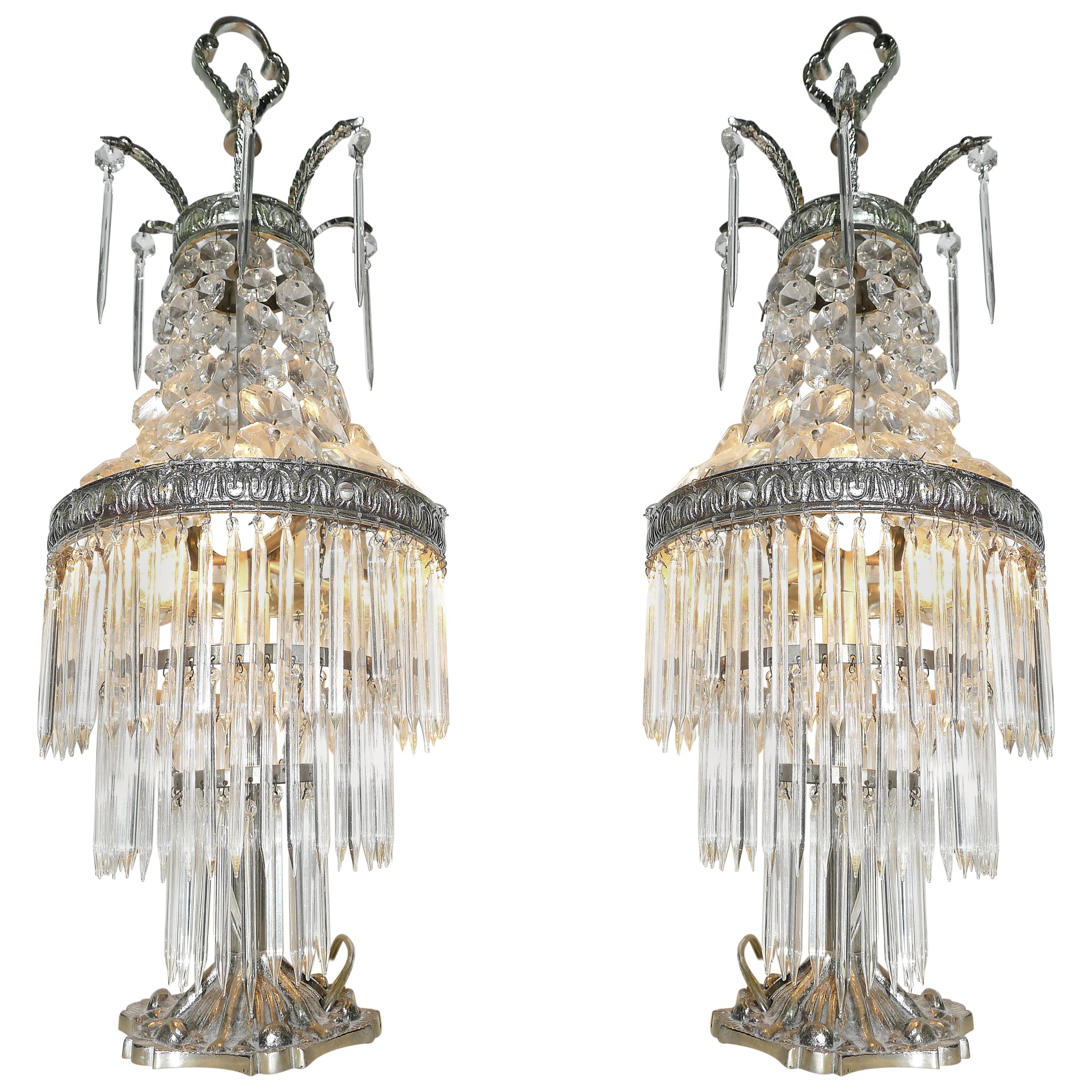 Pair of French Regency Empire in nickel and crystal table lamps. 3 tiers wedding cake.
Housing 2-light bulbs each E14. Nickel detailing with all crystal intact.
Measures:
Height 20.5 in /52 cm
Diameter 8 in /20 cm
Weight 16 lb. / 8 kg
Good working
