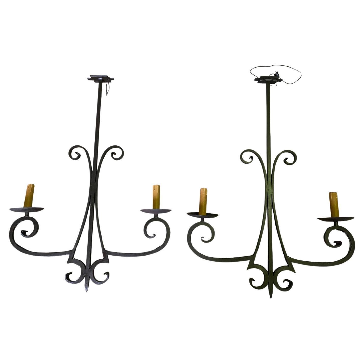 Pair of French Iron Chandeliers For Sale