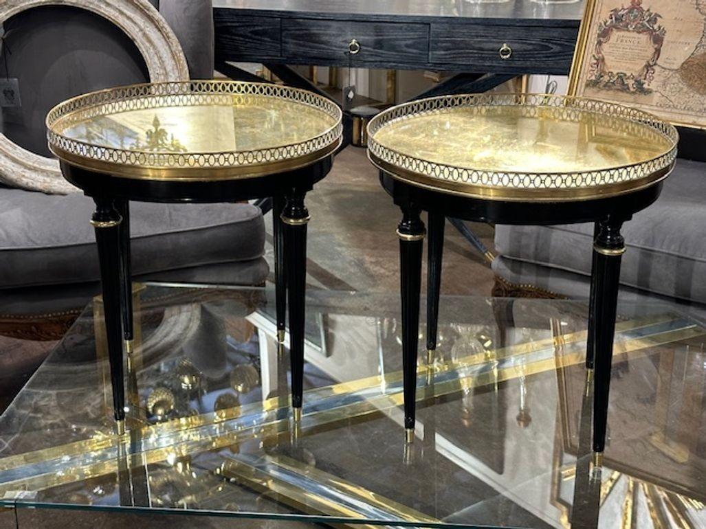 Fine pair of French Jansen manner black lacquer and brass side tables. Circa 1940. Perfect for today's transitional designs!