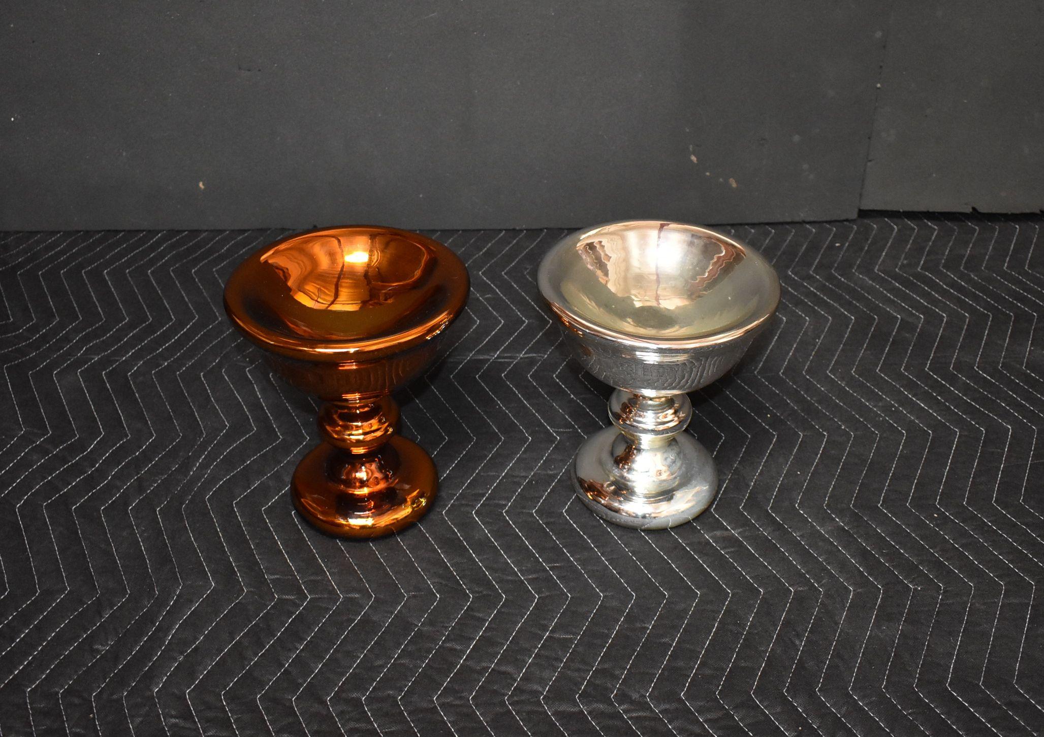 A pair of French midcentury footed glass mercury bowls
One in silver color and the other one with amber color film over mercury glass.