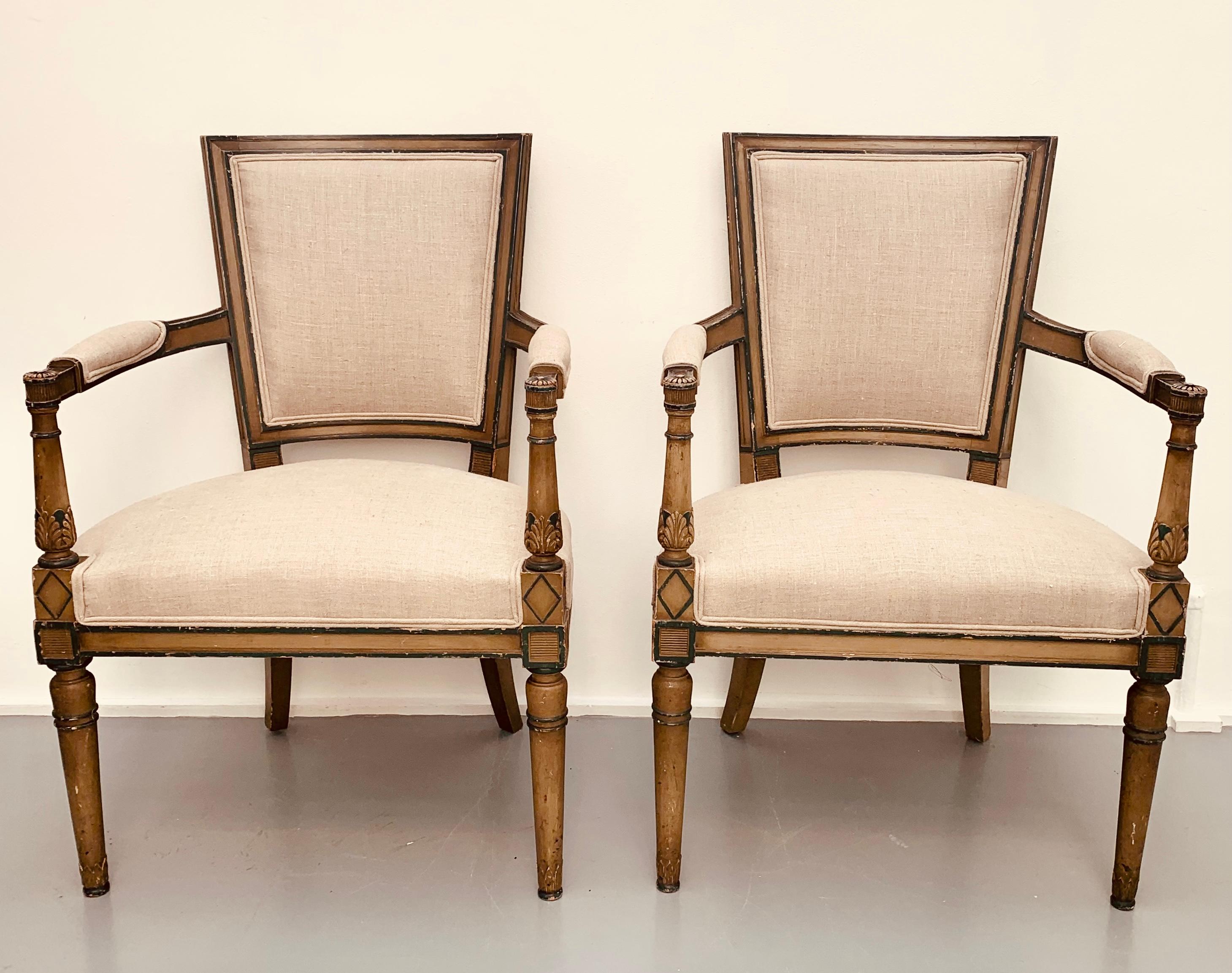 A wonderful pair of French late eighteenth century with their original patina dating from Directoire period circa 1790.  Recently reupholstered in a grey/beige linen fabric.

The frame is carved with geometric patterns and acanthus leaf carvings