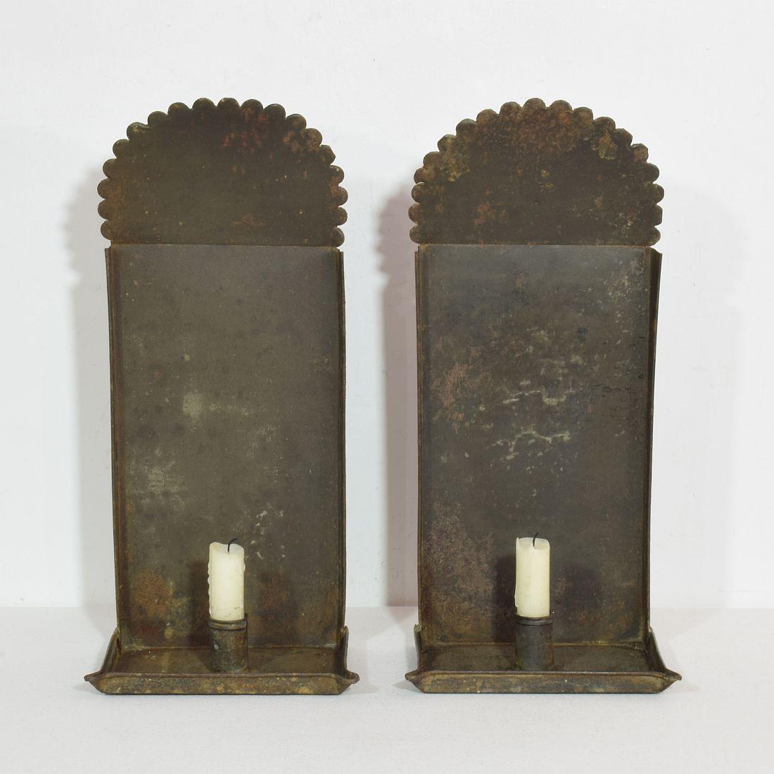 Unique pair of iron wall candleholders.
France circa 1770-1850
Weathered.