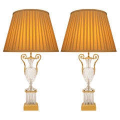pair of French late 19th century Charles X st. Crystal and Ormolu lamps