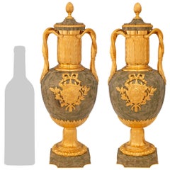 pair of French late 19th century Louis XVI st. Ormolu and Marble urns