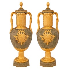 pair of French late 19th century Louis XVI st. Ormolu and Marble urns