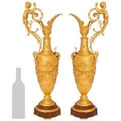 Pair of French late 19th century Renaissance st. Ormolu and marble ewers