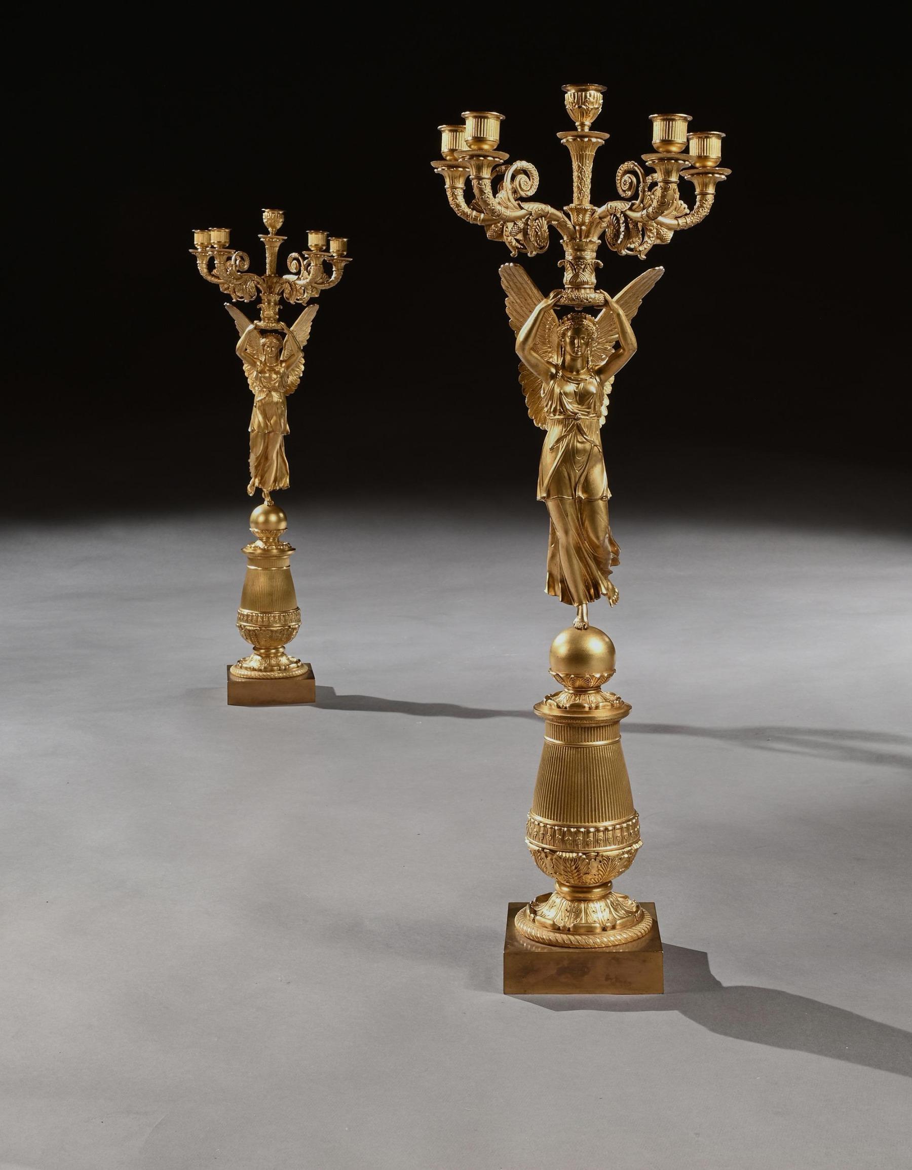 A pair of exceptionally elegant and important late Empire five-light figural candelabra ‘A la Victoire’ in gilt-bronze, attributed to Pierre-Philippe Thomire, after a design by Charles Percier. Imposing size at 81cm in height.

Paris