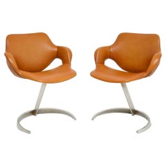 Pair of French Leather and Chrome Scimitar Chairs by Boris Tabacoff