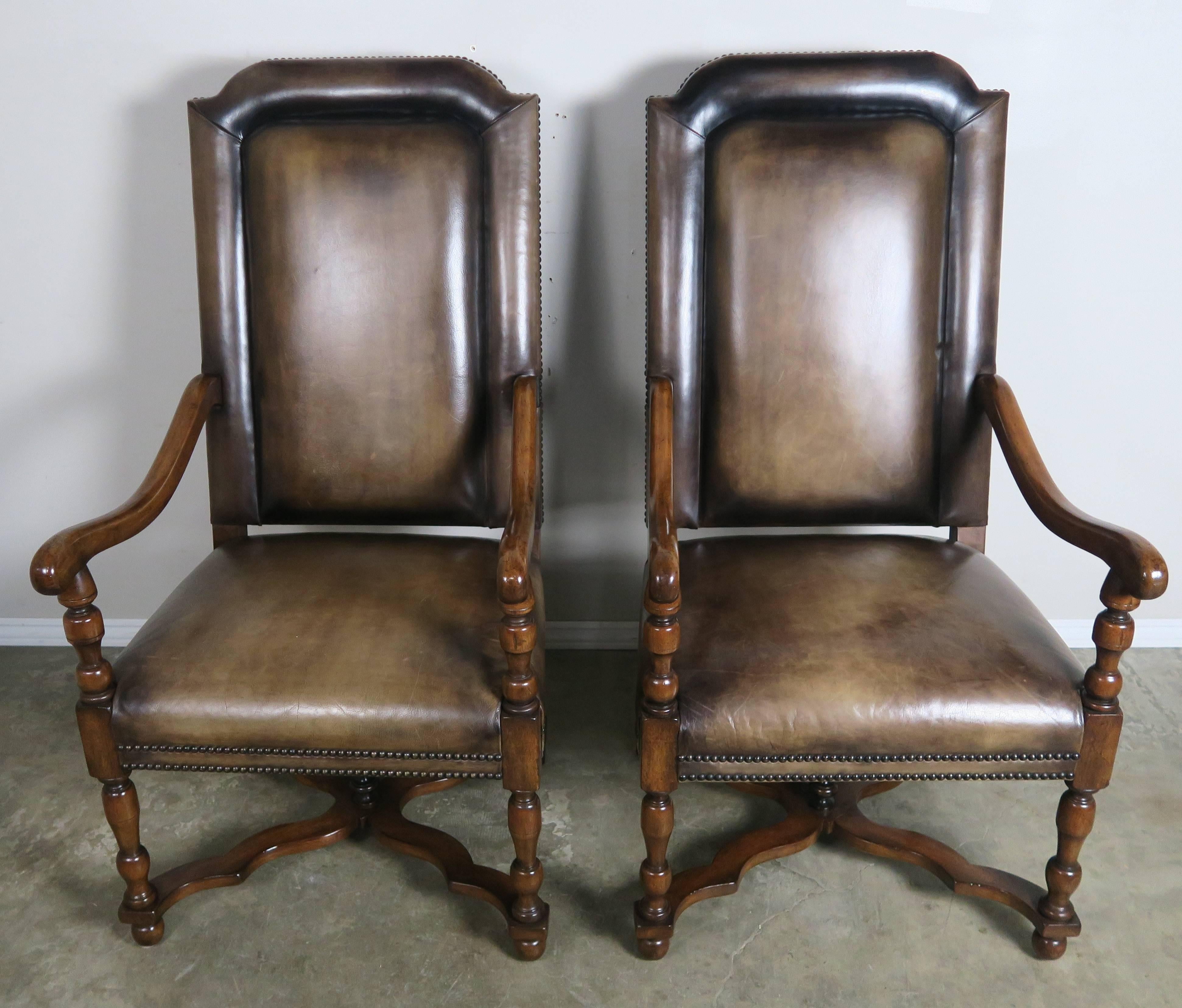 Pair of French walnut leather upholstered armchairs with brown mohair backs and nailhead trim detail. Bottom 