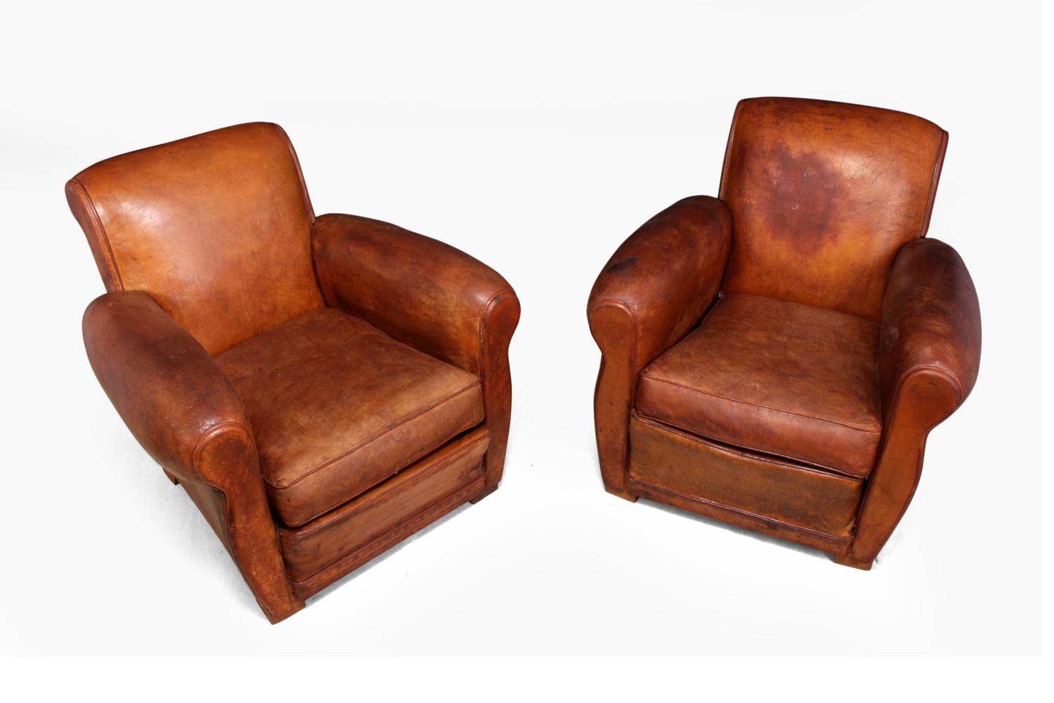 Pair of French leather club chairs
This pair of leather club chairs were produced in France in the 1940s, they have a few repairs and the leather has been fed and conditioned and is soft and strong, they are fully sprung seat back and arms with a