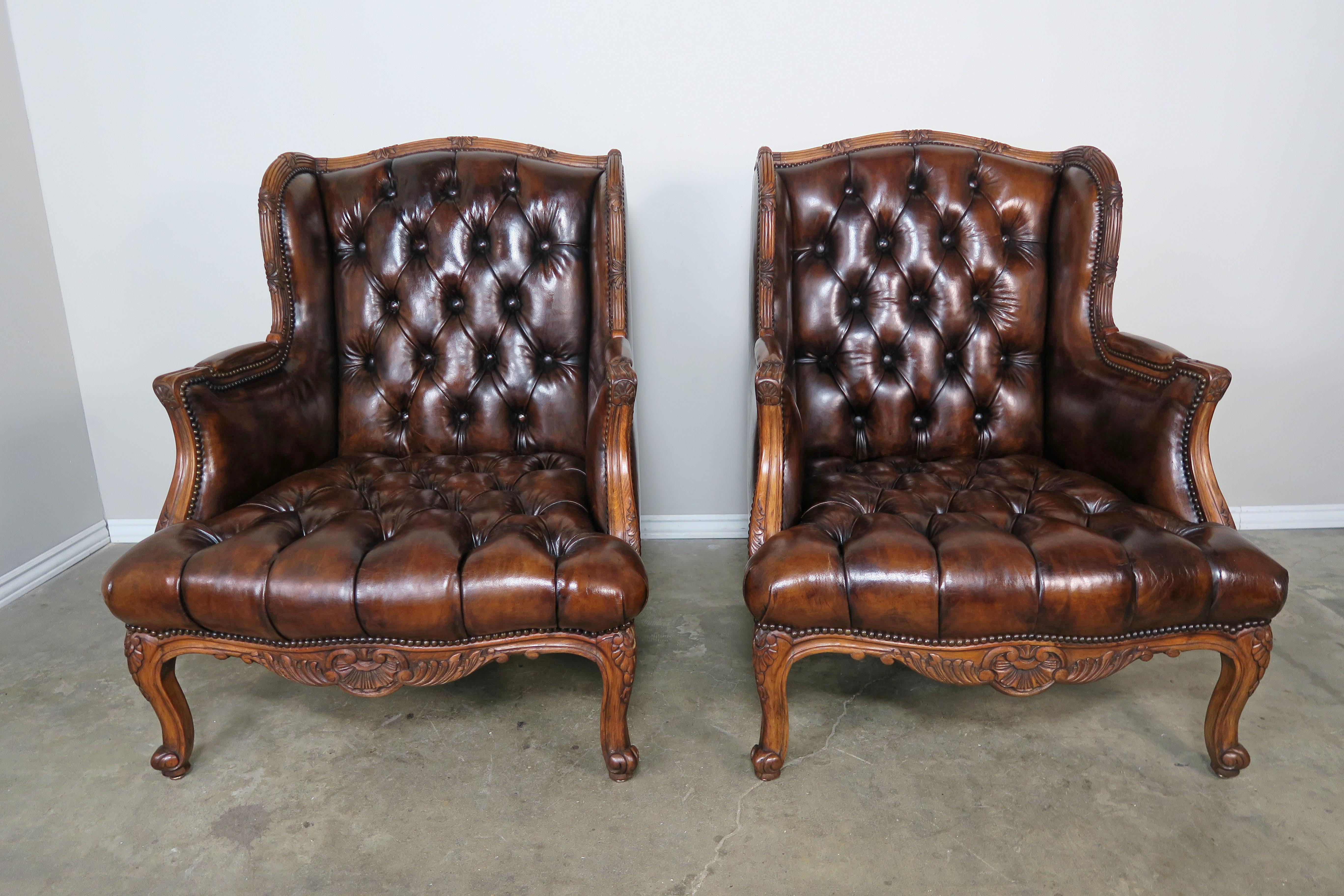 Louis XV Pair of French Leather Tufted Armchairs with Matching Ottomans