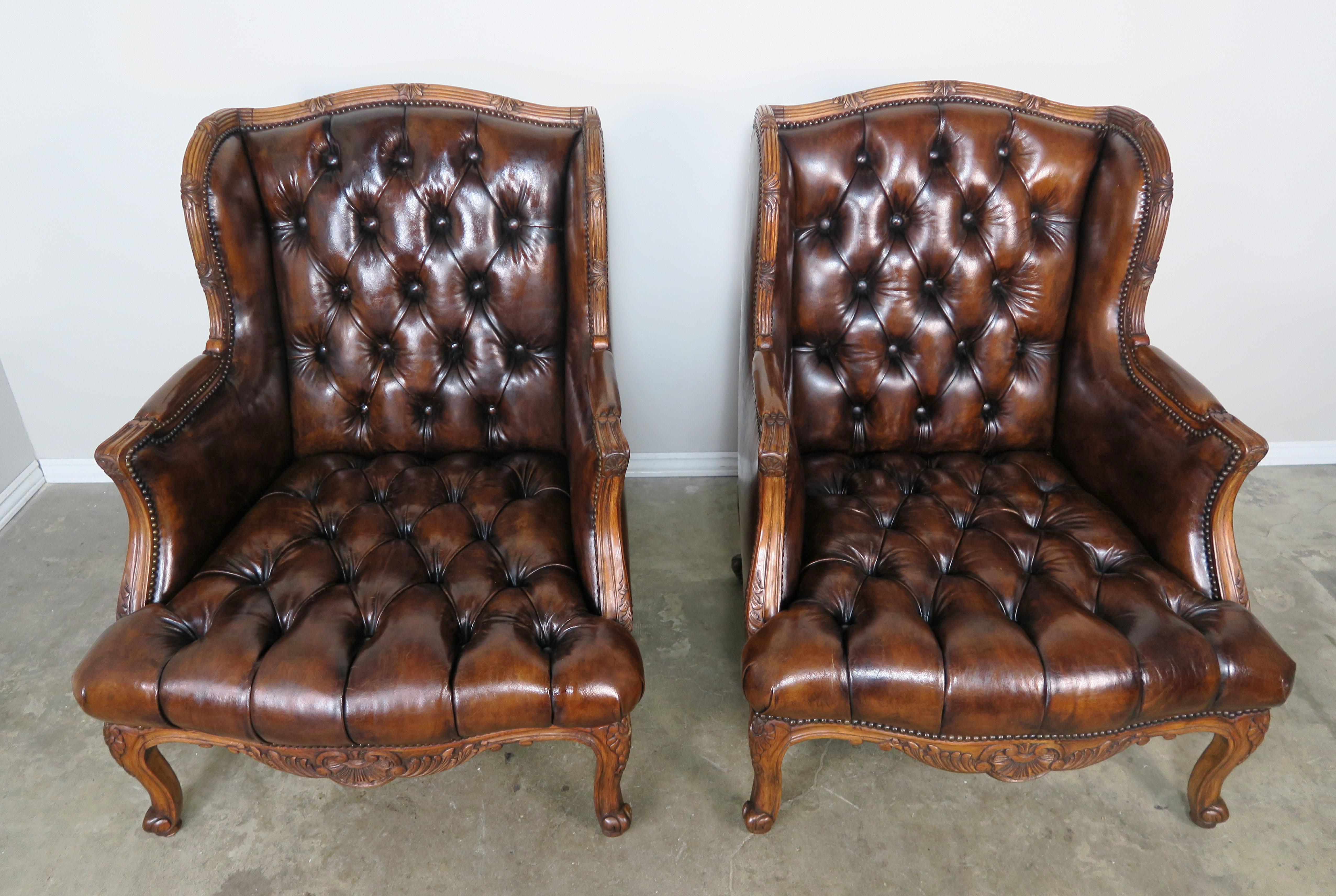 Mid-20th Century Pair of French Leather Tufted Armchairs with Matching Ottomans