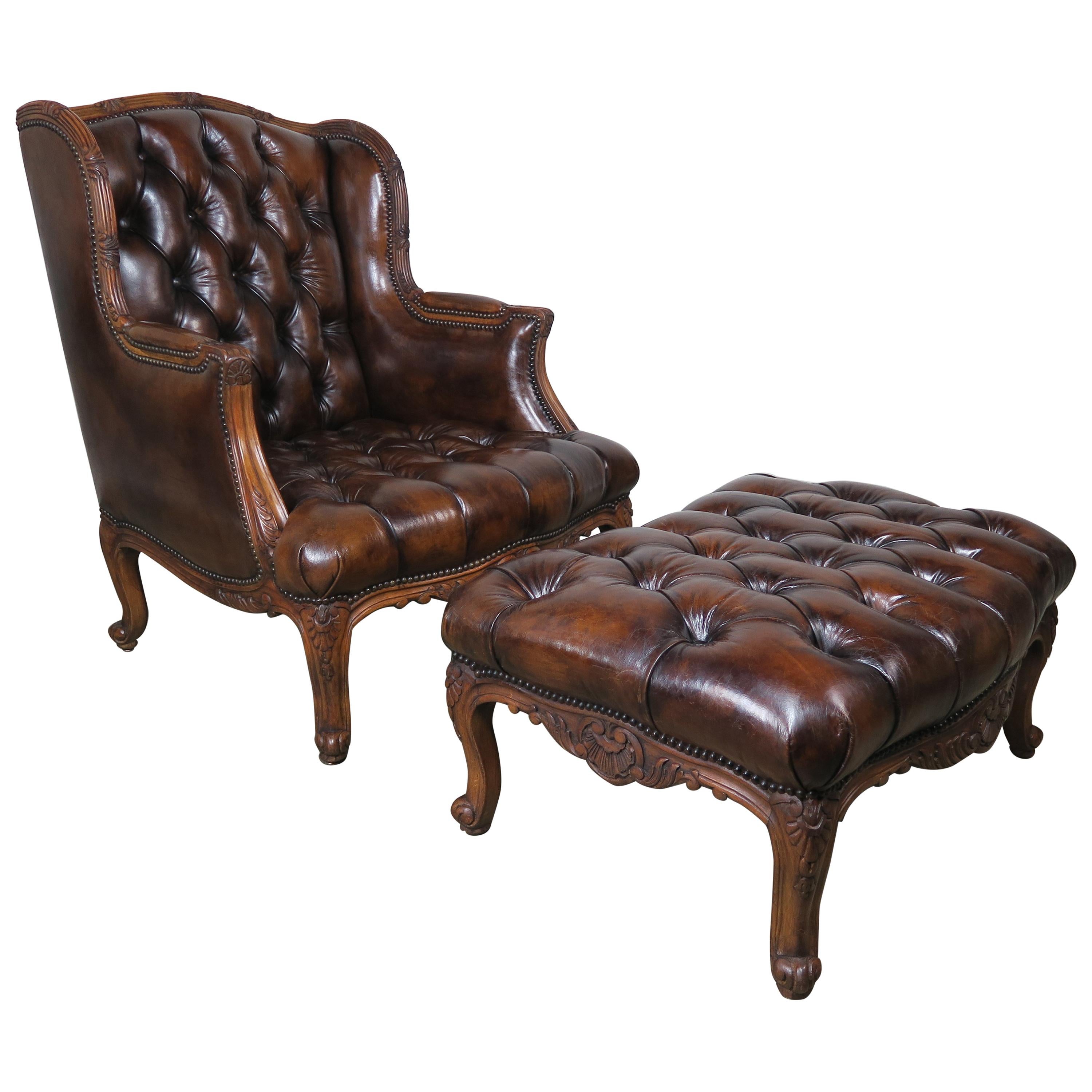 Pair of French Leather Tufted Armchairs with Matching Ottomans