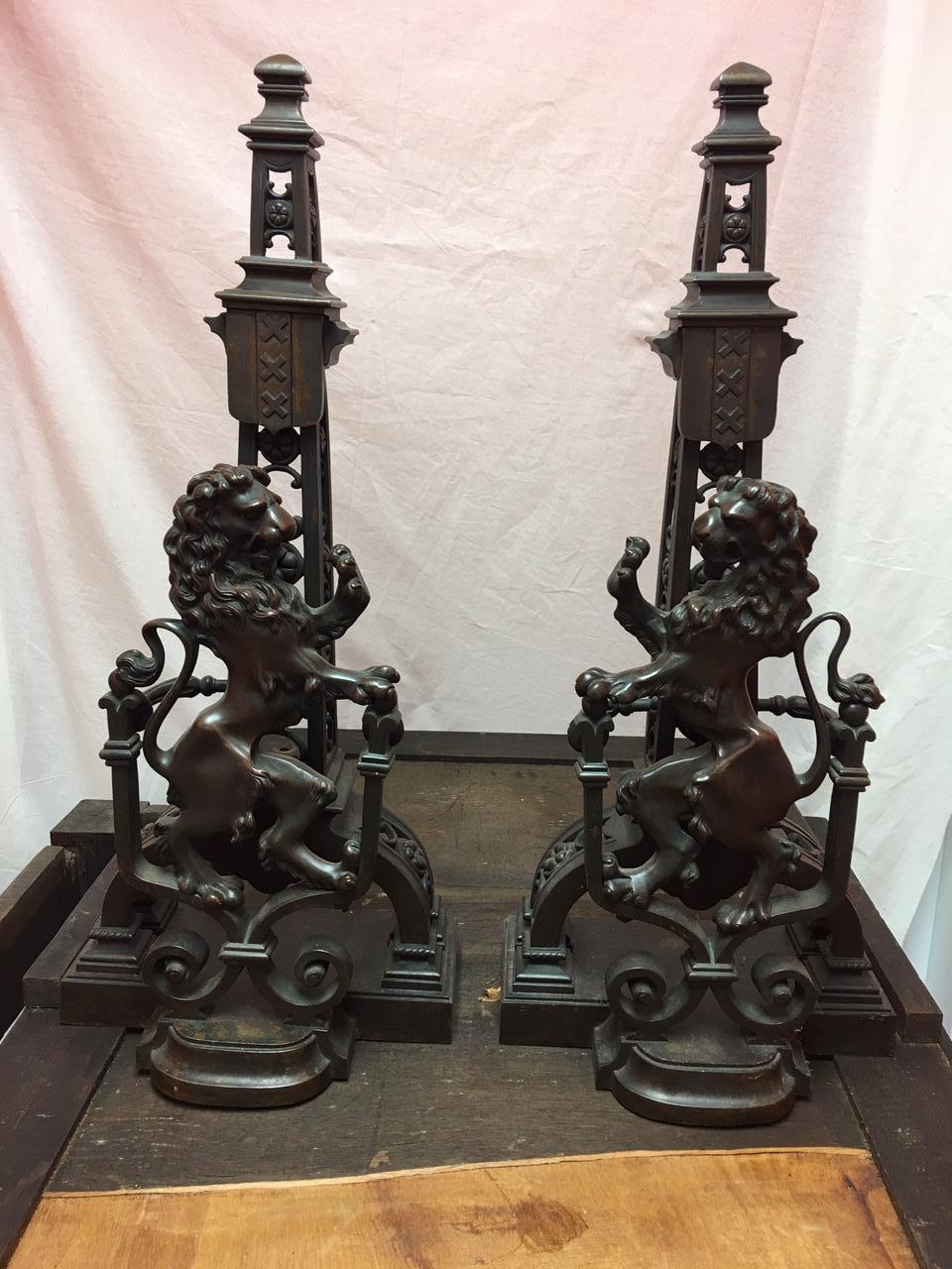 Pair of French lion motif bronze andirons, 19th century.