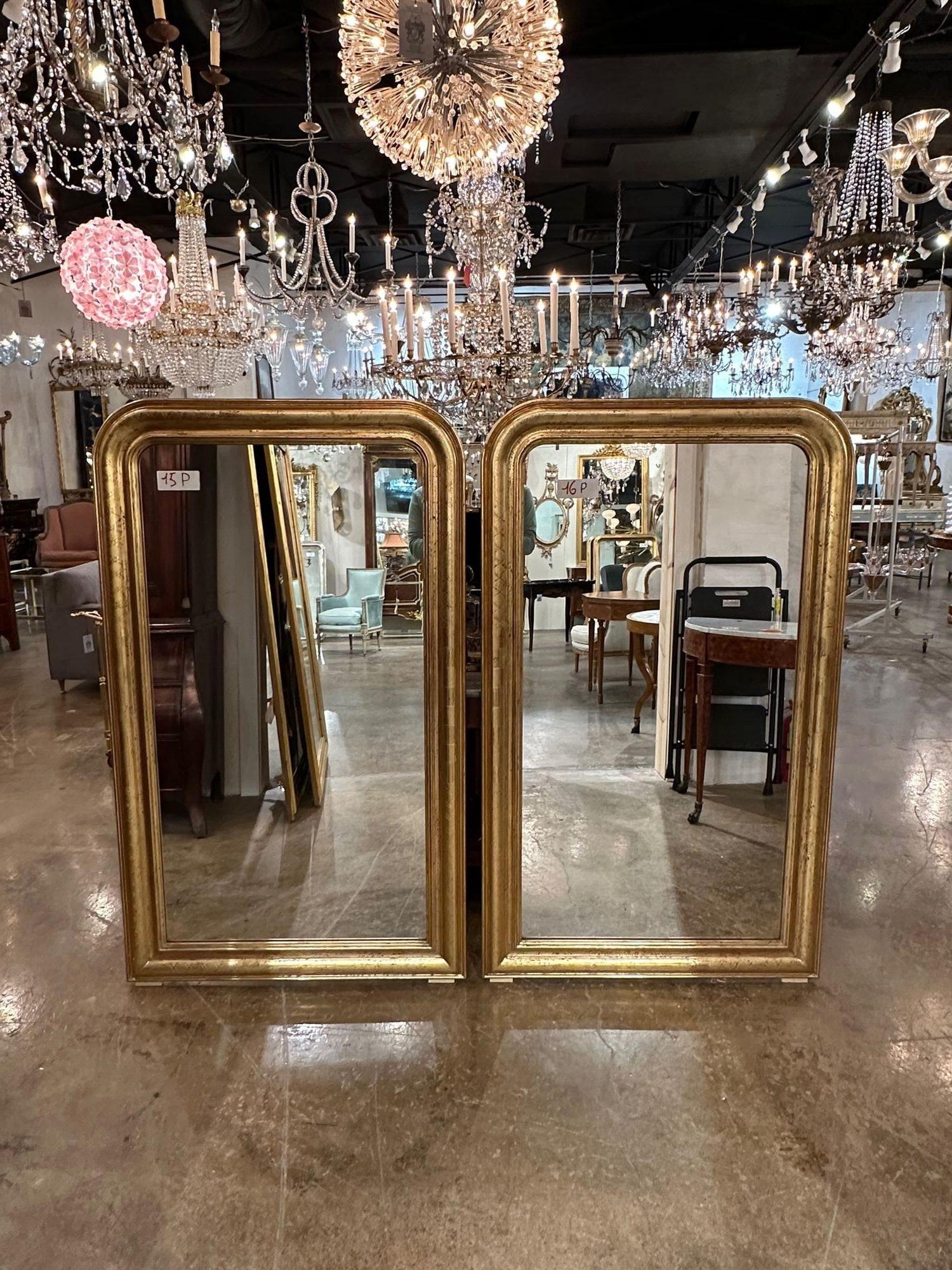 Very nice large scale pair of French Louis Philippe Giltwood mirror with an X pattern. Very fine patina. Creates a beautiful classic look!!