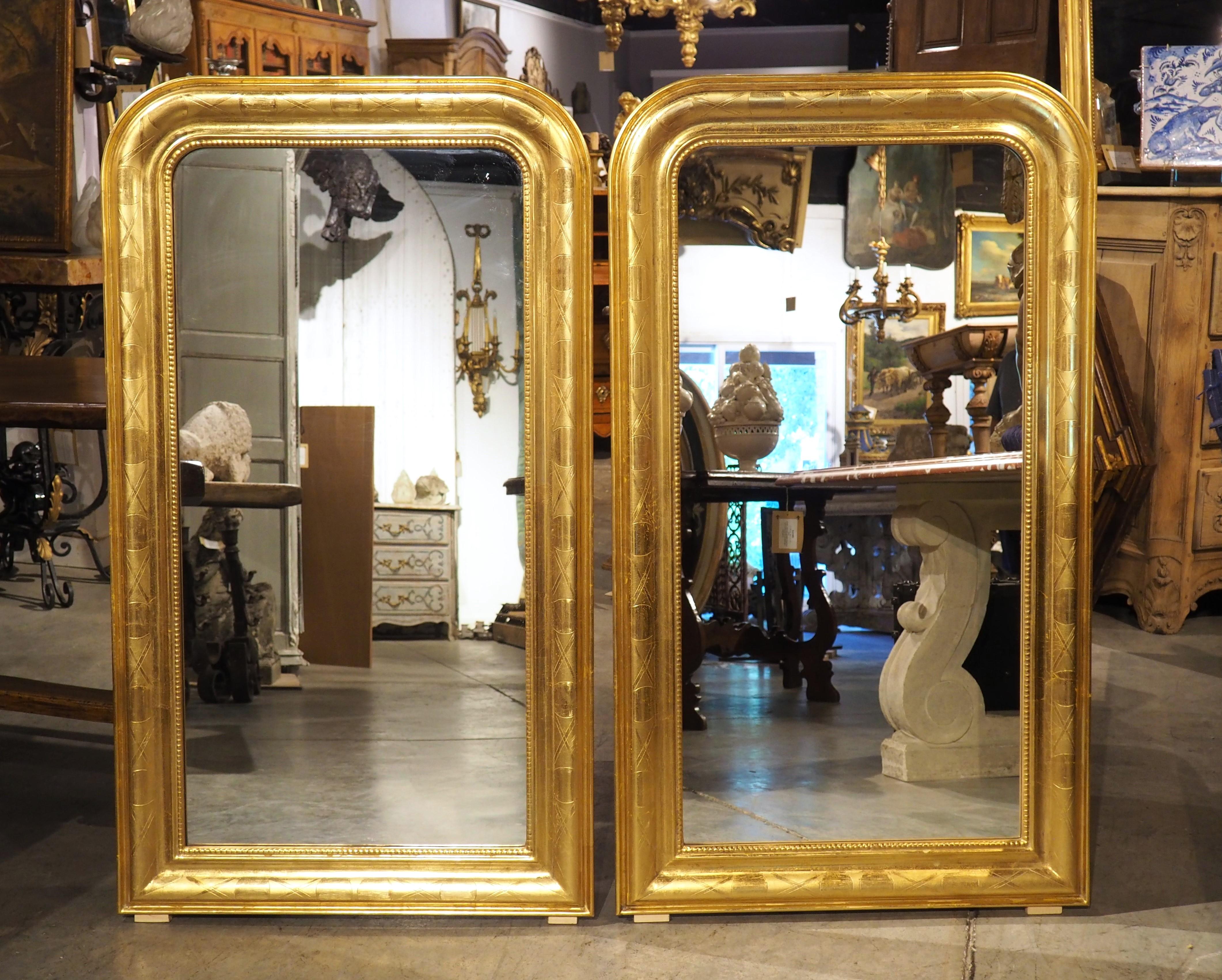 Hand-Carved Pair of French Louis Philippe Style Gold Leaf Wall Mirrors, 20th Century