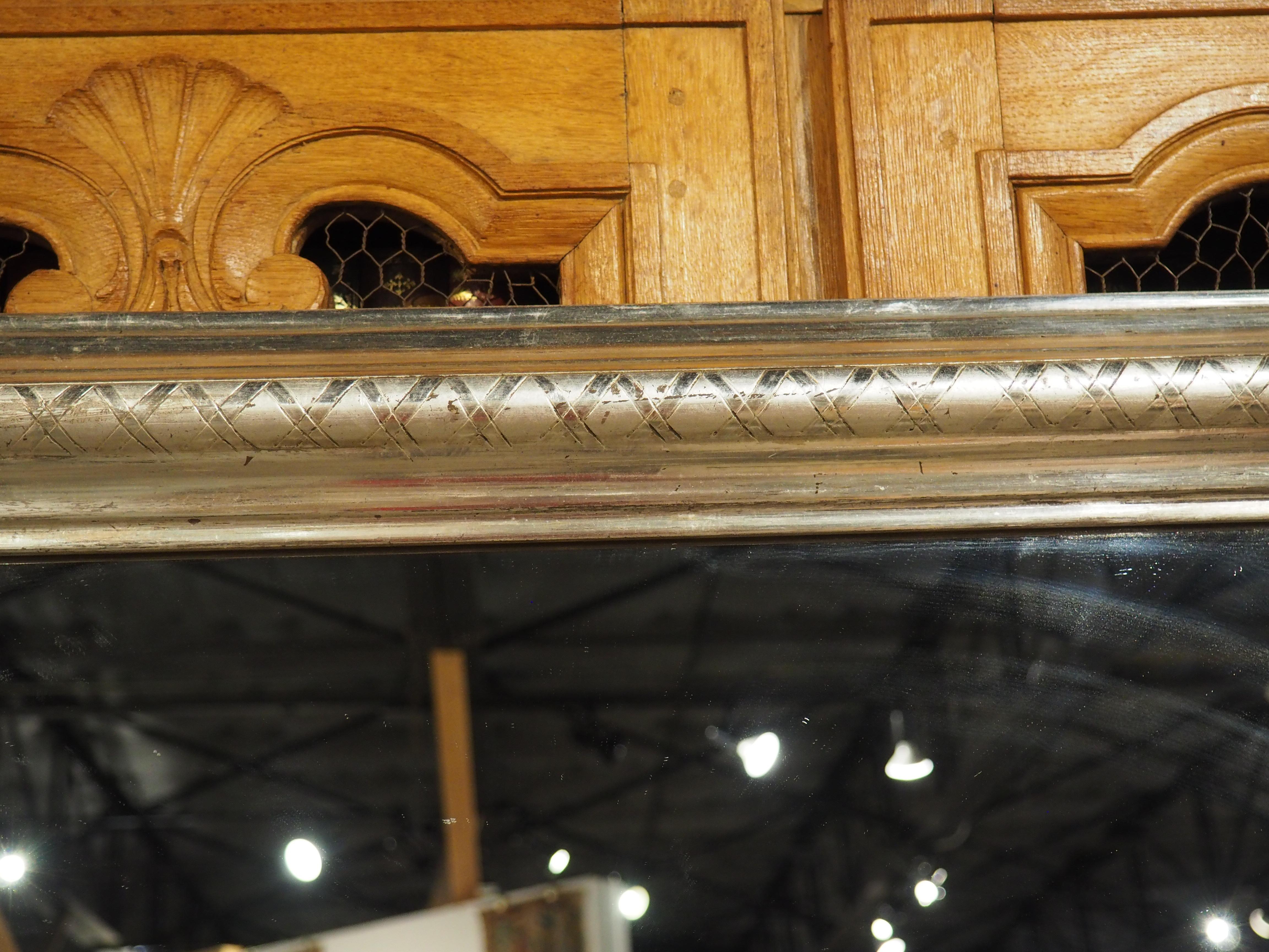 Paire de miroirs à feuilles d'argent de style Louis Philippe avec décor en X en vente 1