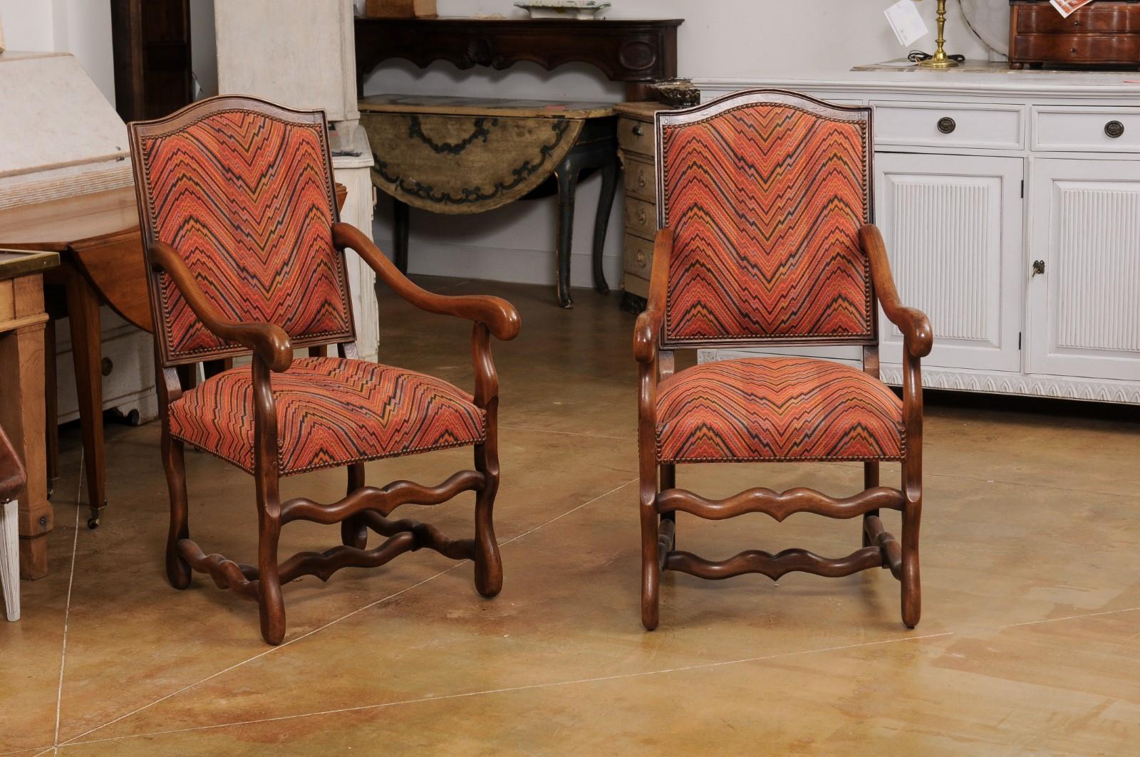 Carved Pair of French Louis XIII Style 1900s Camelback Fauteuils with Os de Mouton Base