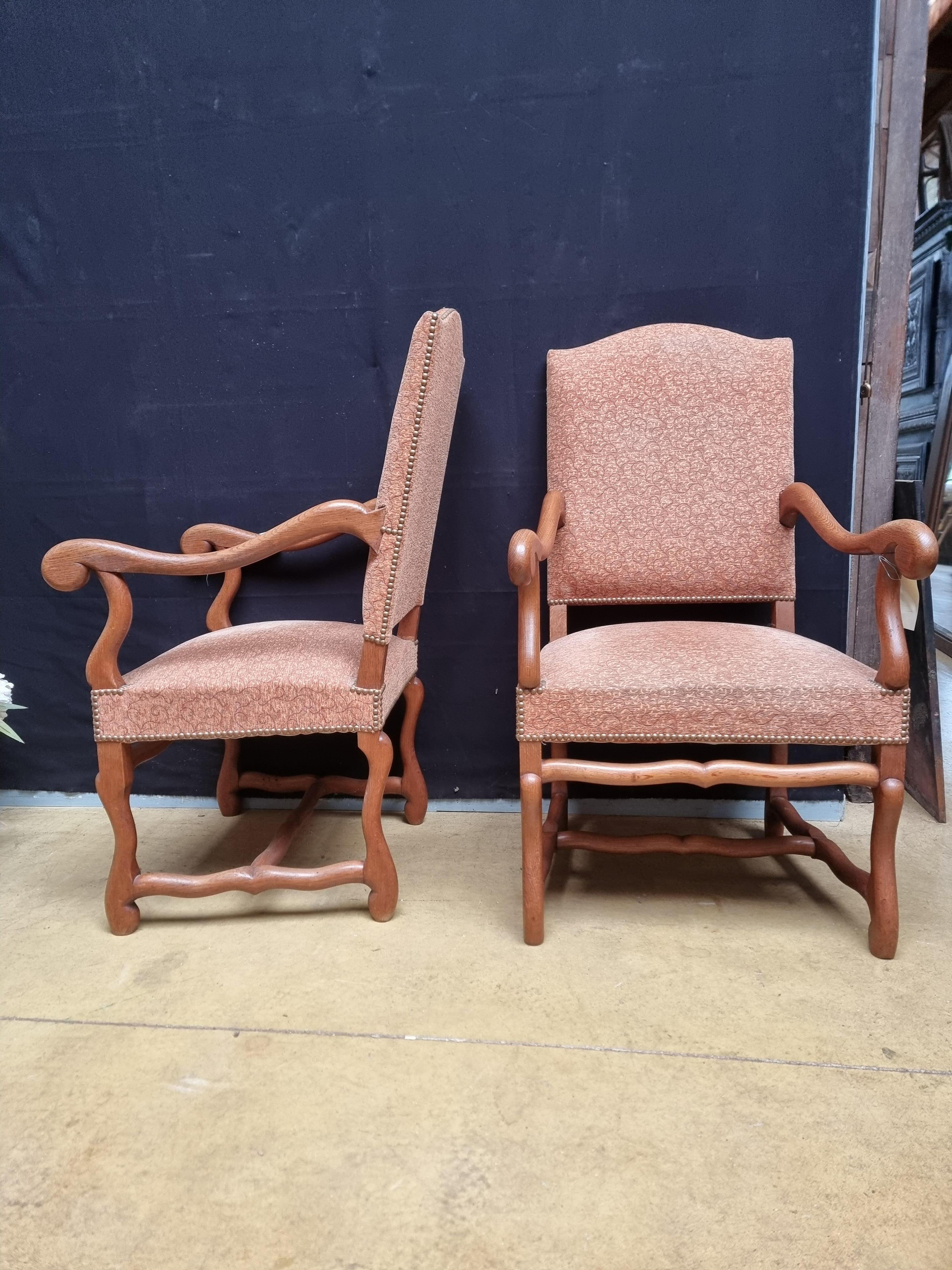 Carved Pair of French Louis XIII Style Walnut Os de Mouton Chairs with Scrolling Arms For Sale