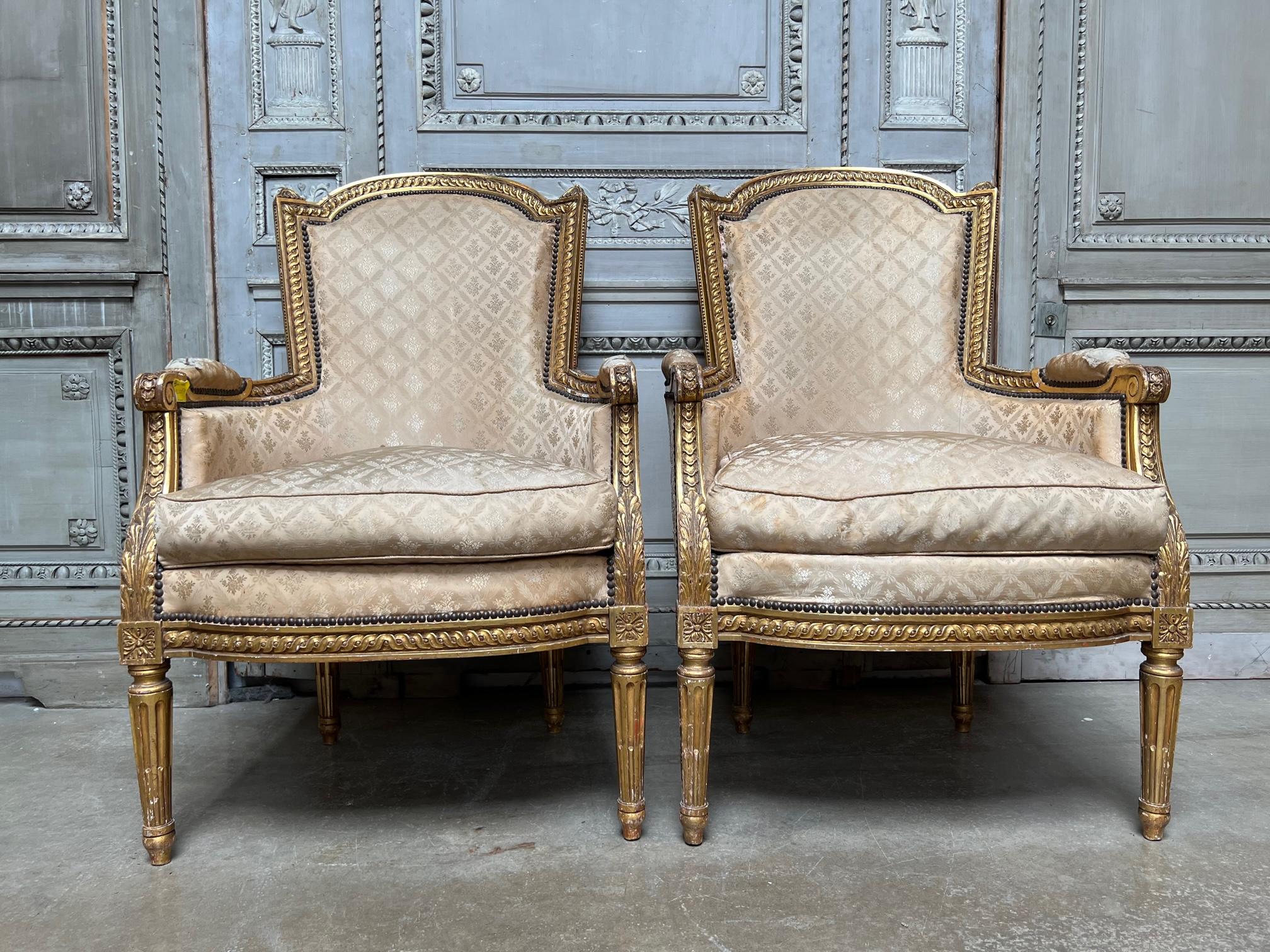 Louis XVI Pair of French Louis XIV Style Gilt Wood Bergeres For Sale