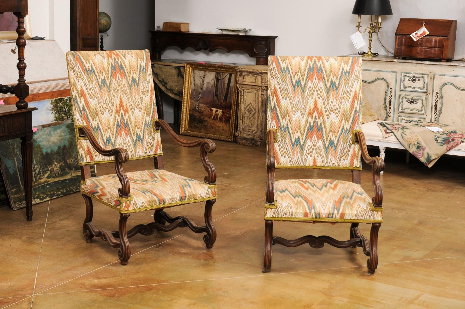 Carved Pair of French Louis XIV Style Walnut Armchairs with Os de Mouton Bases