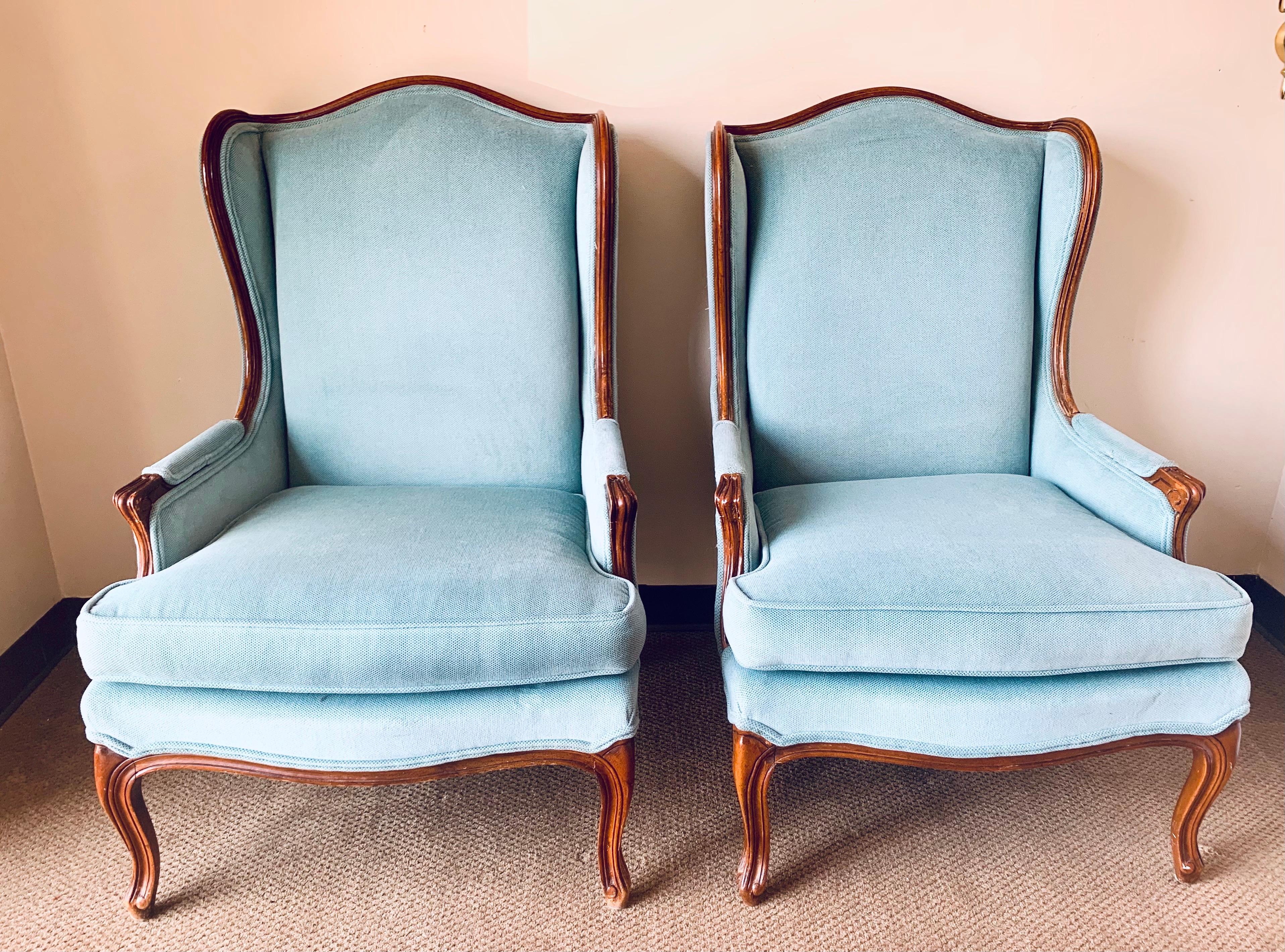 Elegant pair of vintage French wingbacks with the most gorgeous light blue cotton chenille upholstery. Small pulls on back corners. Now, more than ever, home is where the heart is.