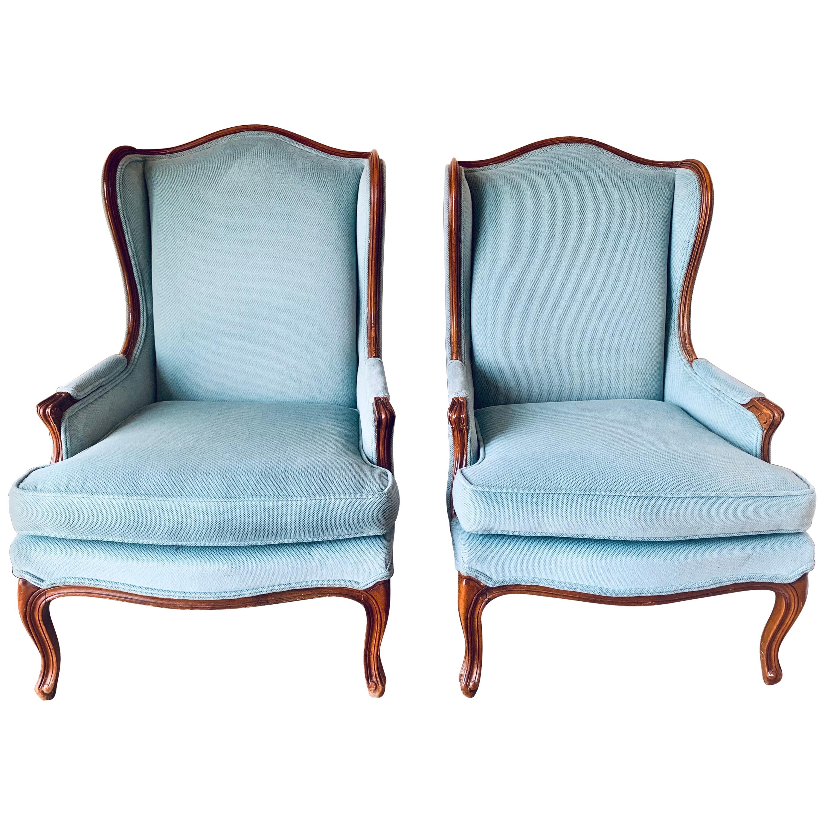 Pair of French Louis XV Blue Upholstered Carved Wingback Chairs