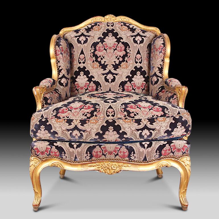 Pair of exceptional quality down filled Louis XV style carved and gilt-framed armchairs from Paris. This pair is stamped with the makers mark of Design House Claude Dalle, Romeo of Paris, known for designing some of the most expensive interiors in