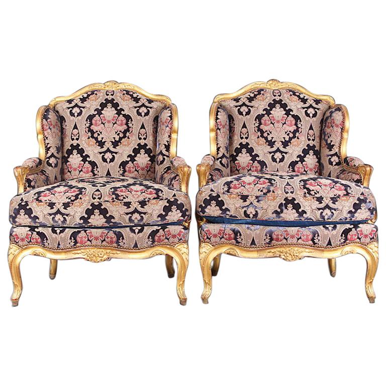 Pair of French Louis XV Carved and Gilt Framed Armchairs L'attelier Claude Dalle