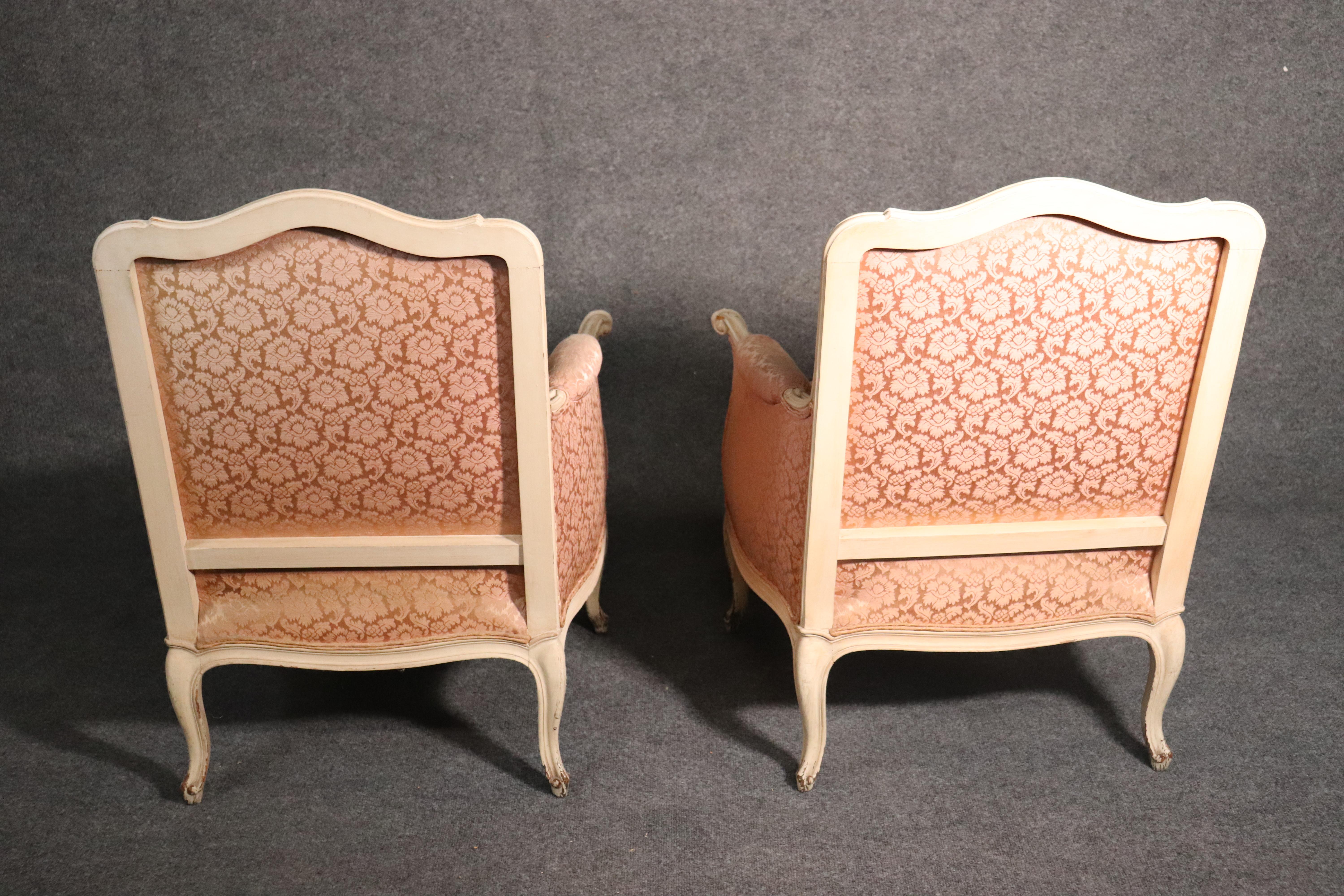 Mid-20th Century Pair of French Louis XV Crème Painted Bergère Lounge Chairs with Pink Damask