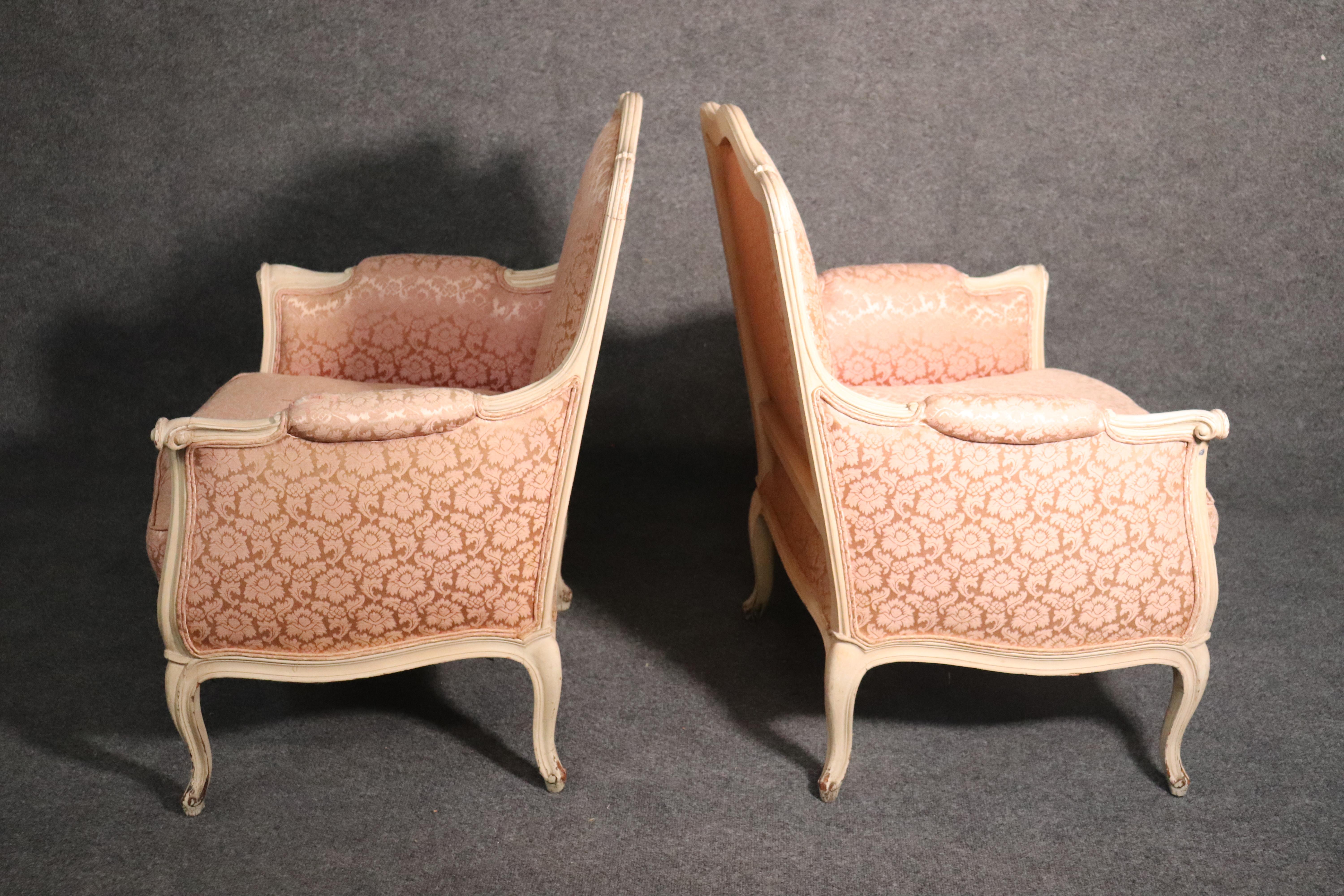 Beech Pair of French Louis XV Crème Painted Bergère Lounge Chairs with Pink Damask